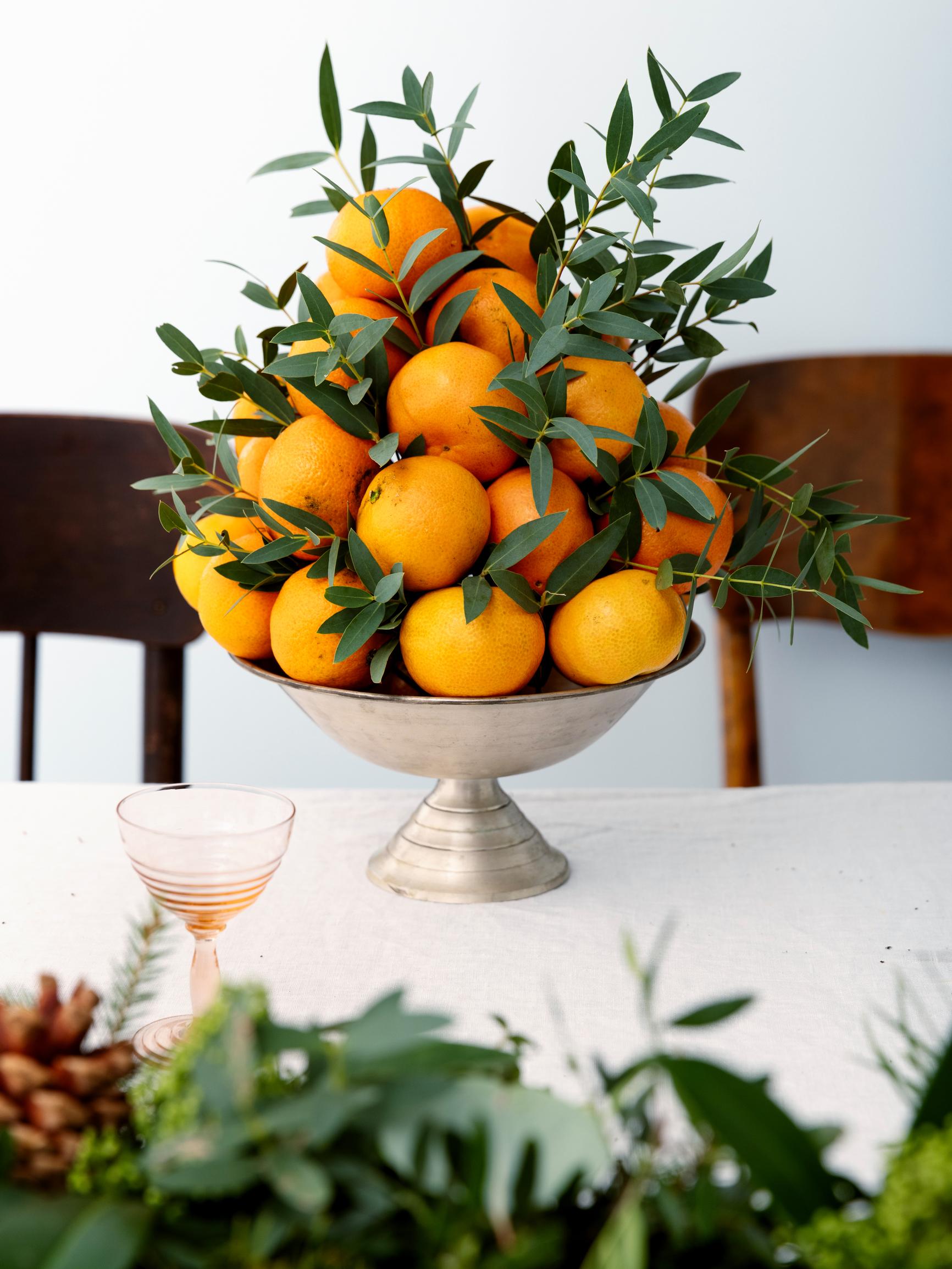 This season’s hit: the mandarin Christmas tree—make an easy, showstopping centerpiece for your Christmas table