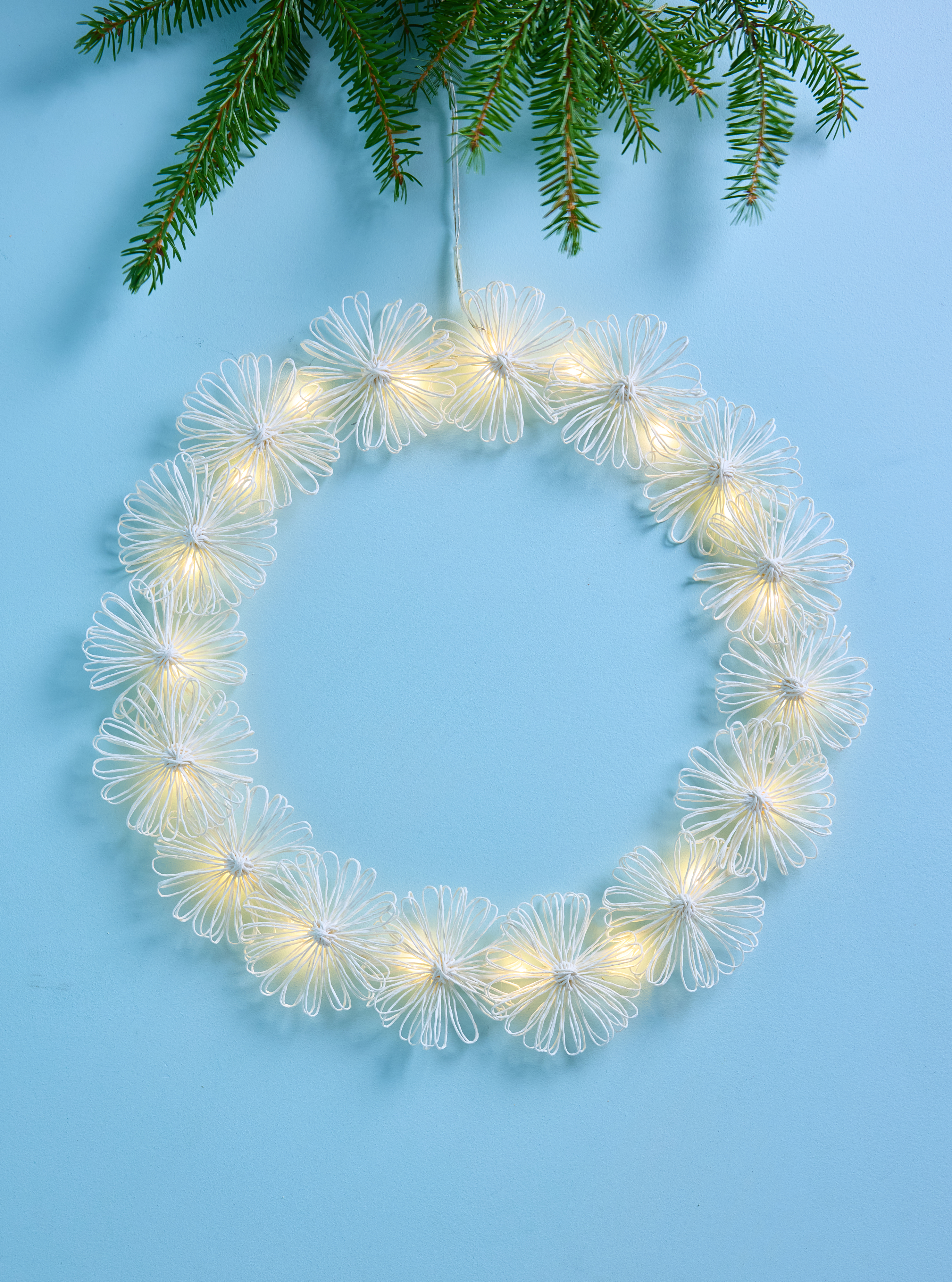 How to make a glowing paper-twine wreath with string lights | Kotona Living