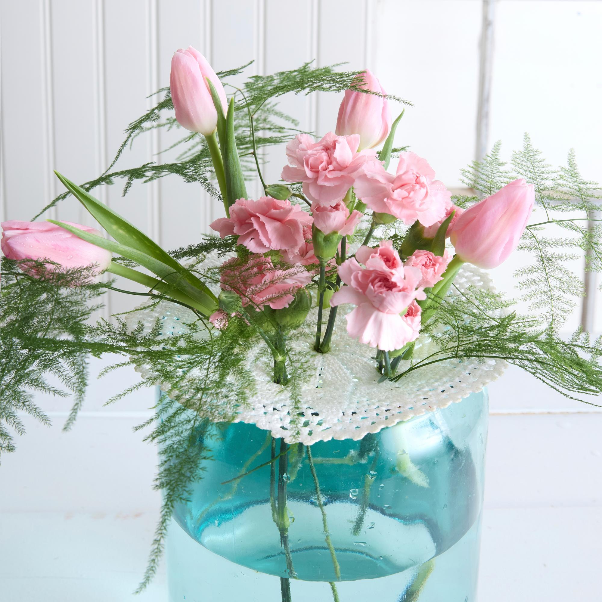 Reuse what you have: Turn an old lace doily into a pretty flower support