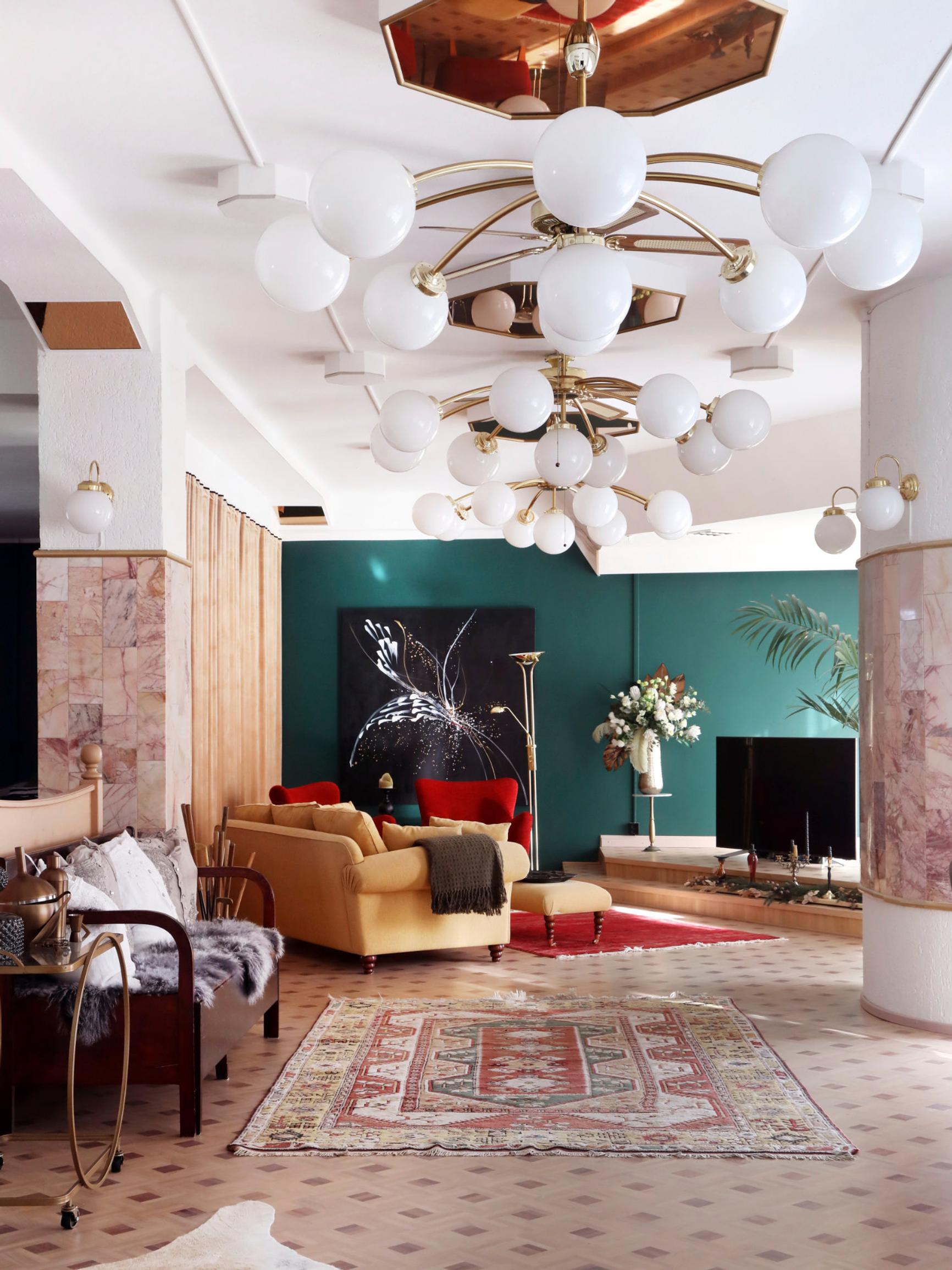 Inside Sanna’s giant studio apartment in a former Kingdom Hall—complete with a pulpit and marble walls