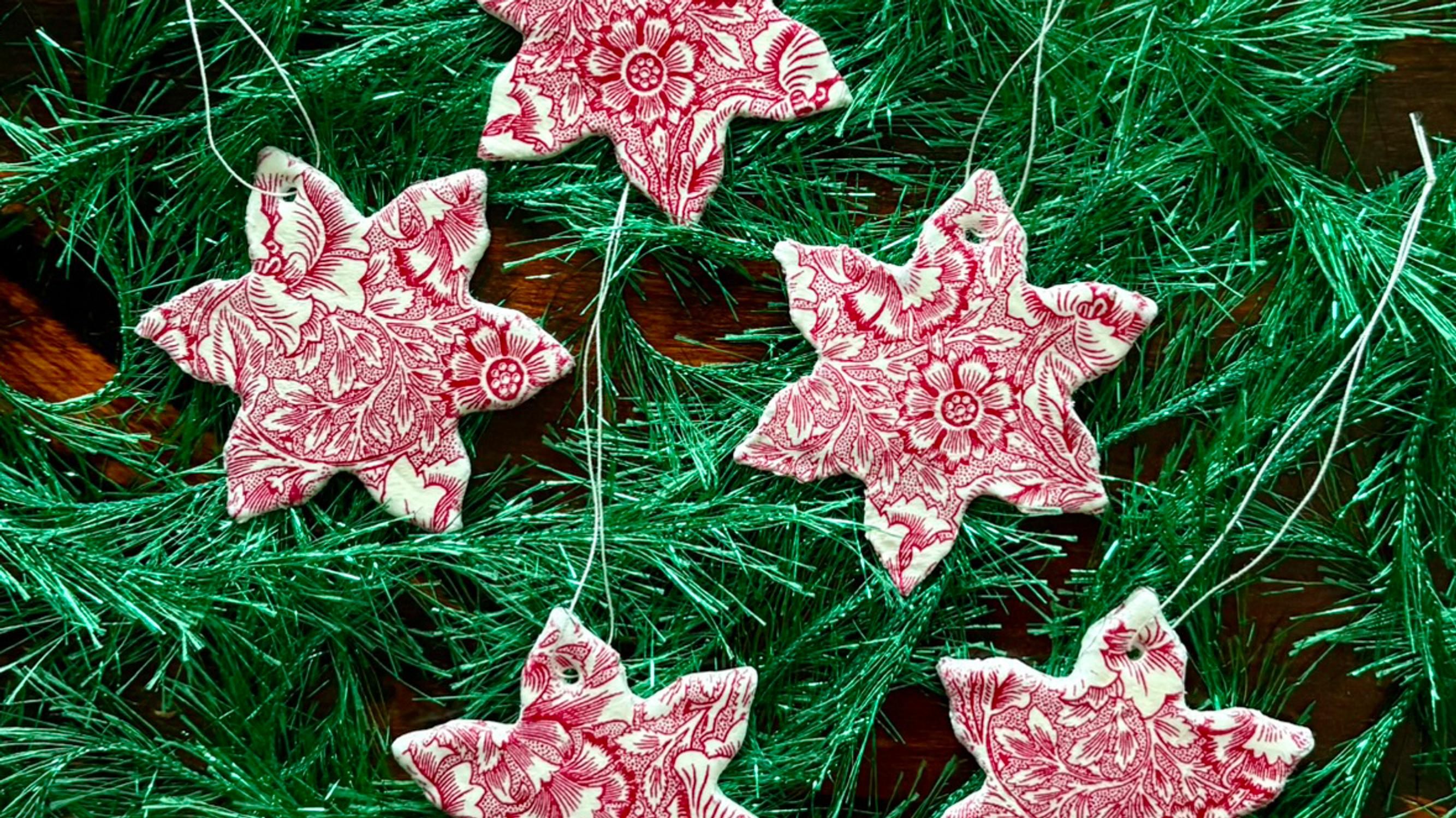 Make air-dry clay star ornaments—a napkin prints the pattern, a cookie cutter shapes them