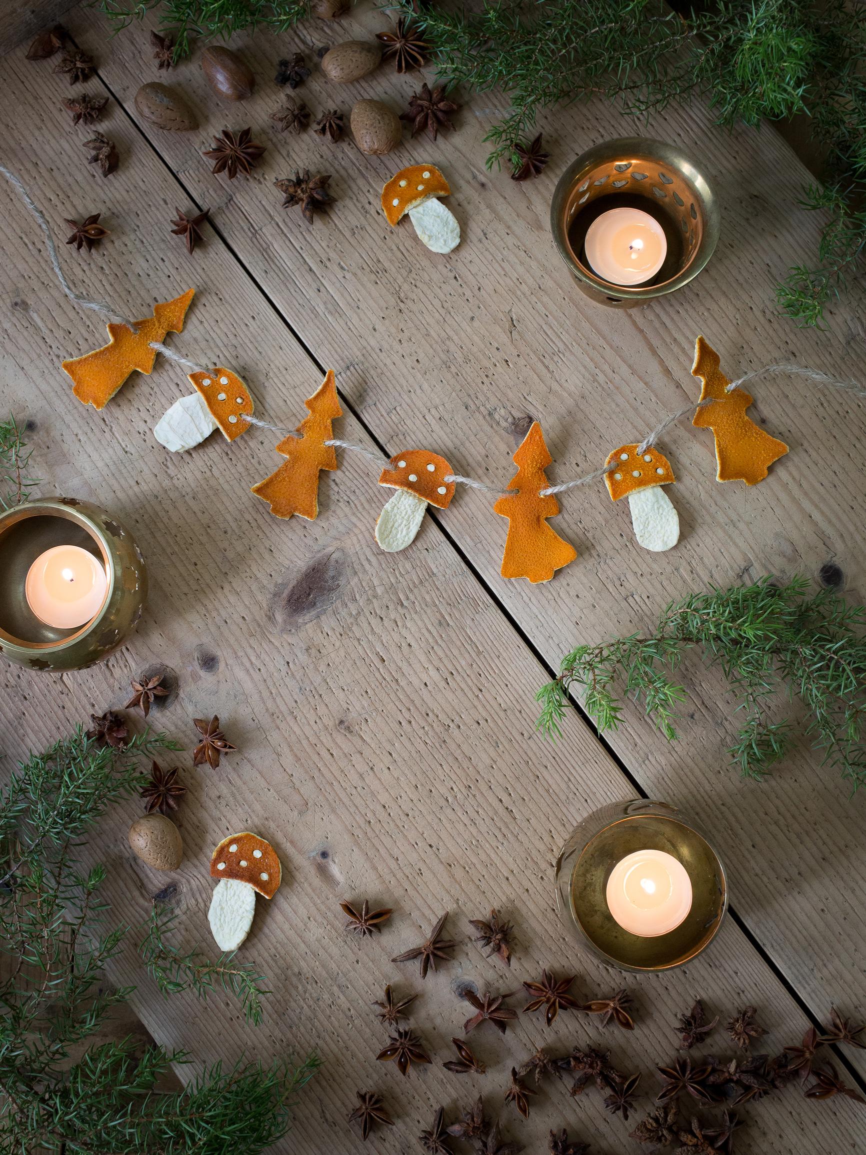 Turn orange peels into charming Christmas decorations—cookie-cutter trees and cute little mushrooms