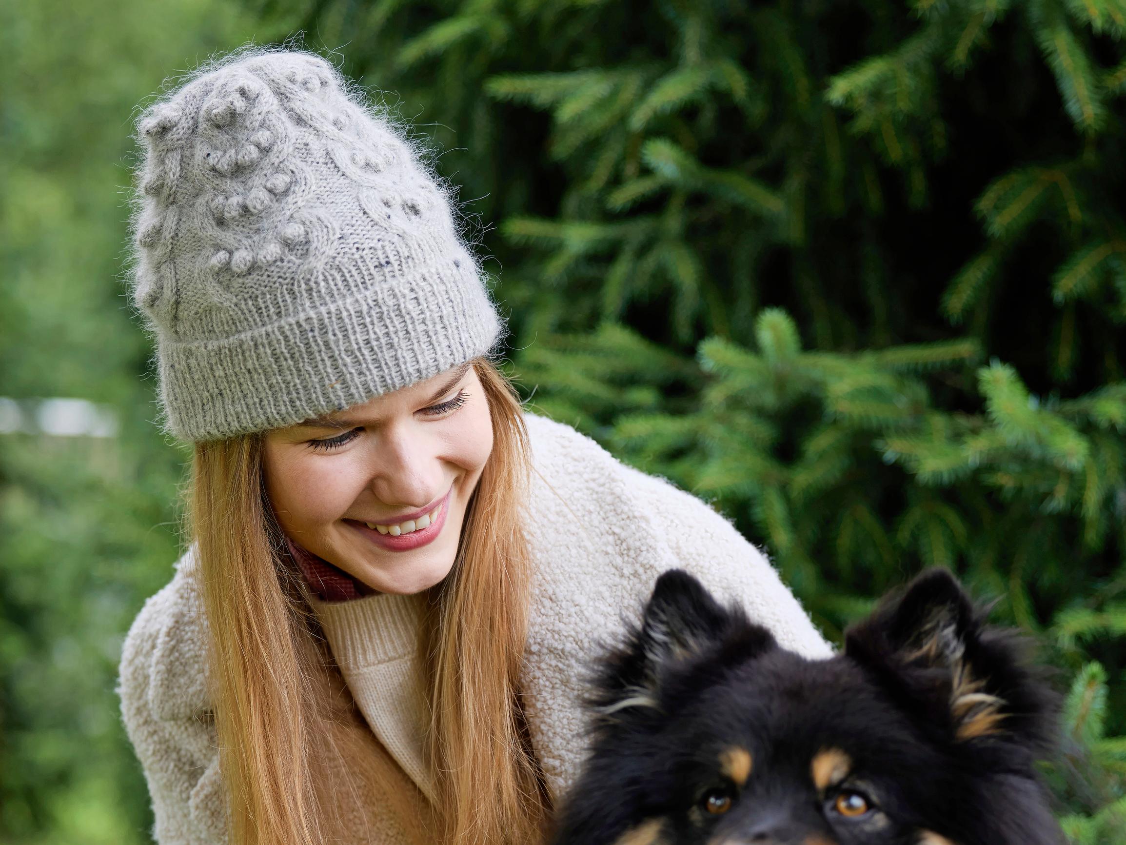 Cast on a stunning cable-knit hat with decorative bobbles