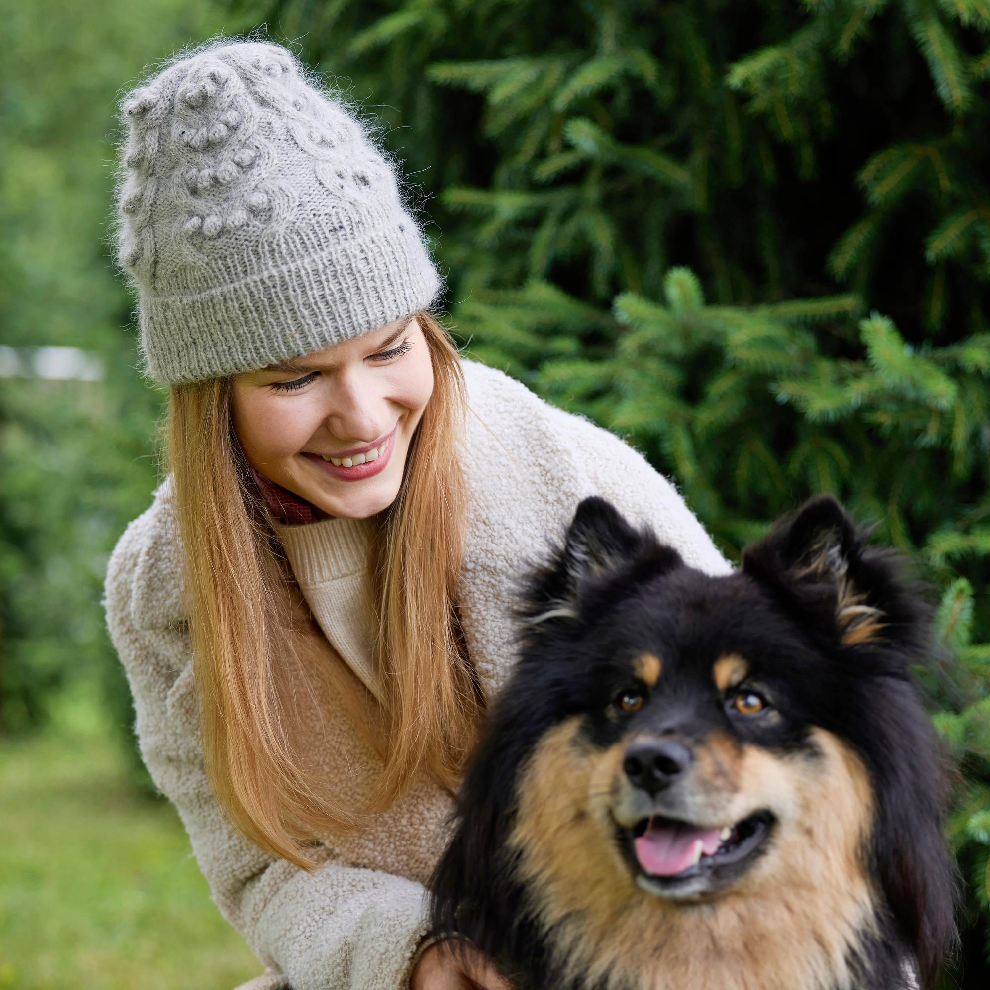 Cast on a stunning cable-knit hat with decorative bobbles