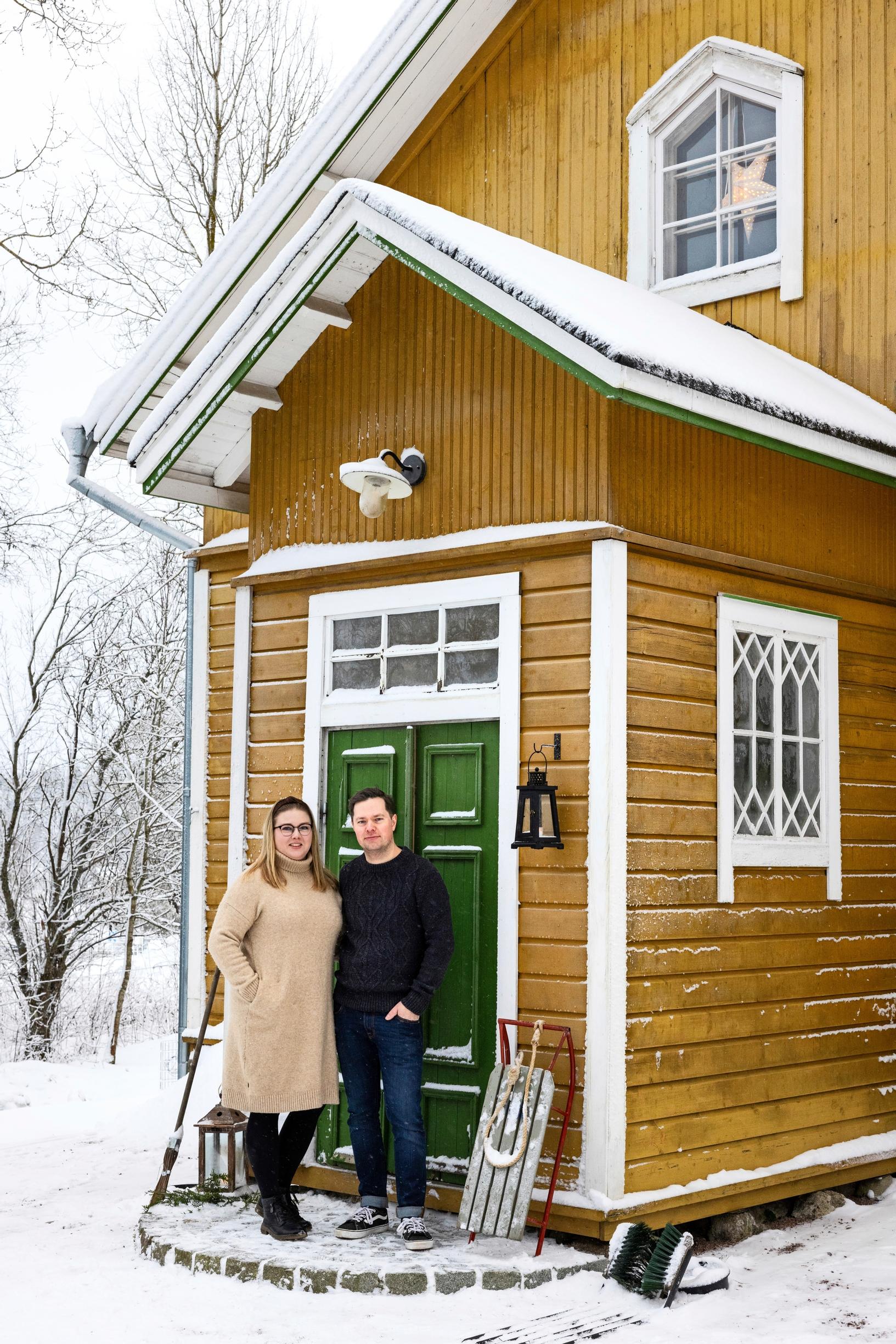 Jarkko and Maria Oja at their front door