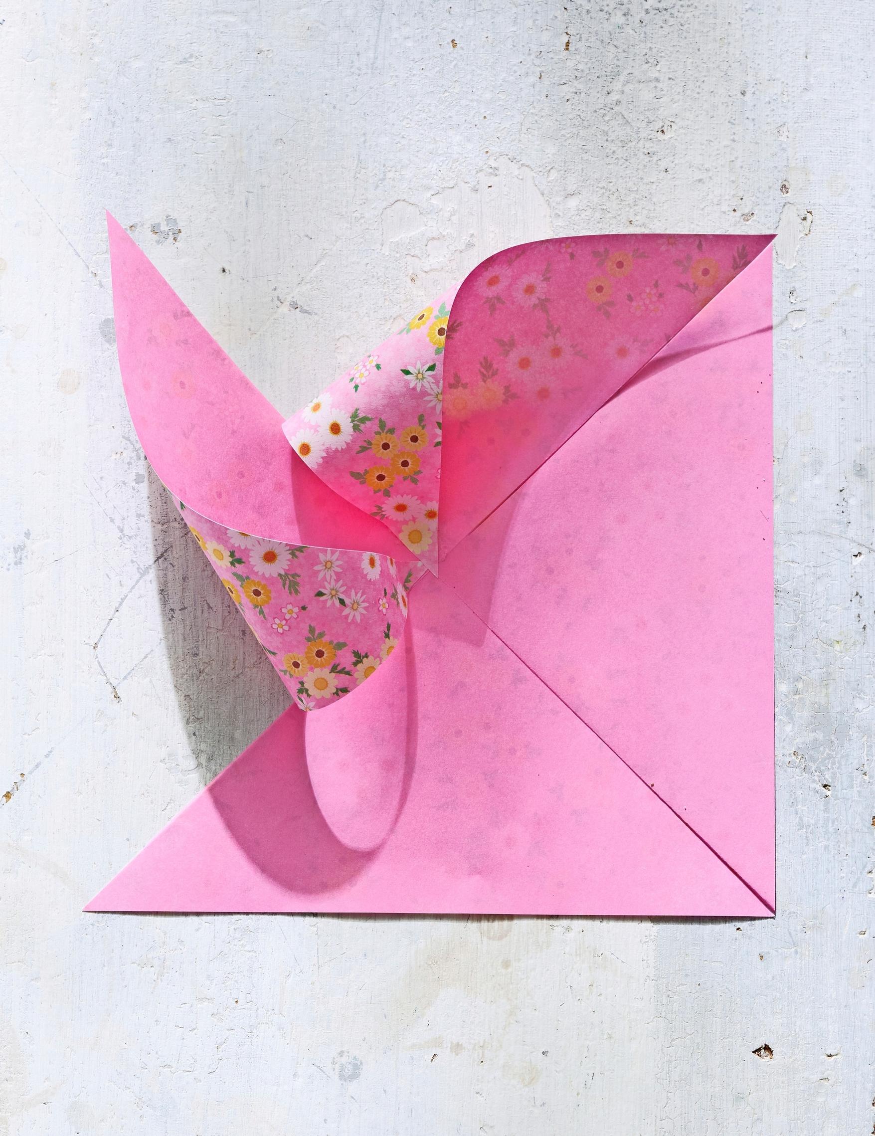 Folding the pinwheel.