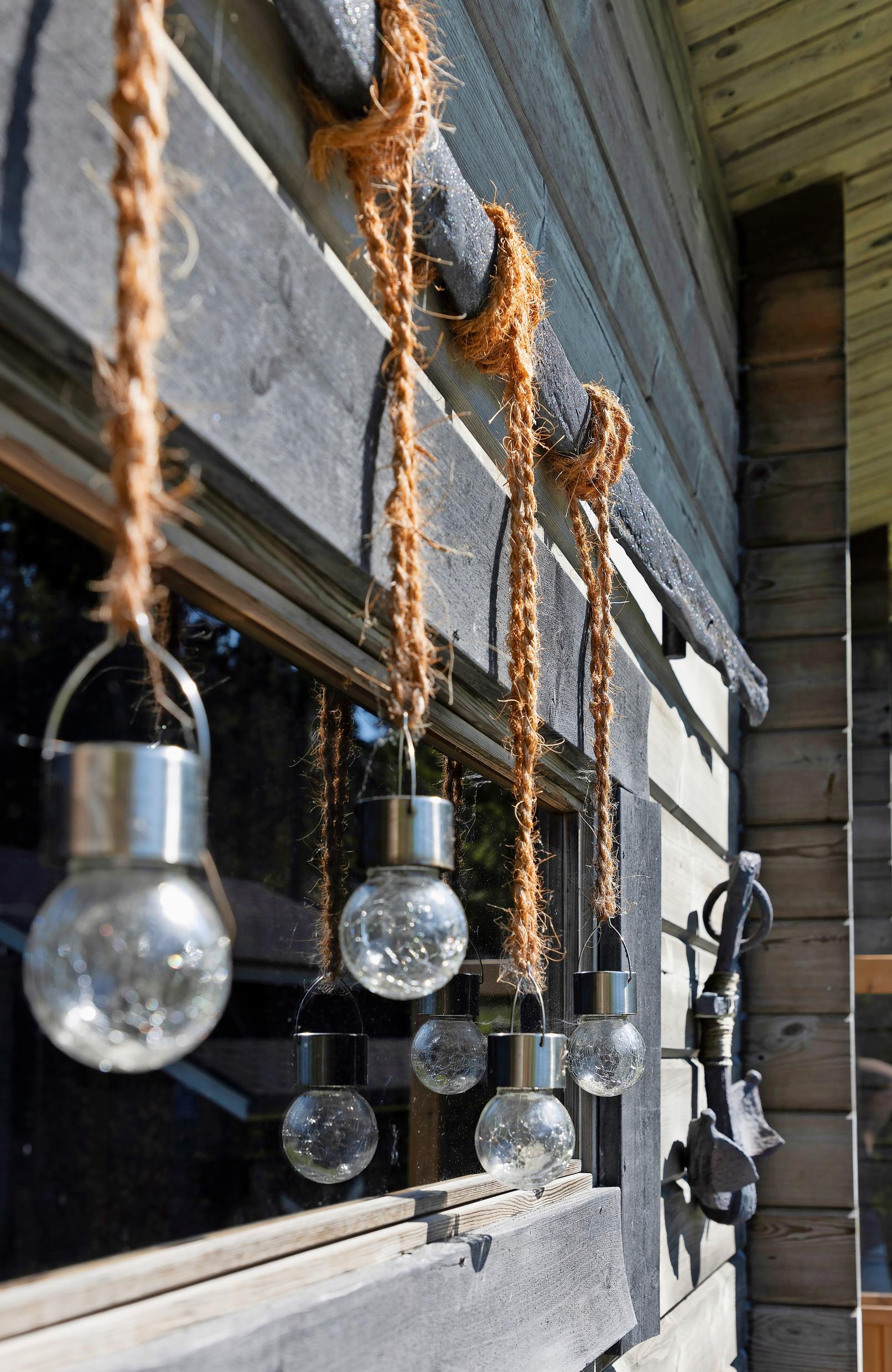 A string of lights hung above the sauna window in Marita and Eki’s island cottage