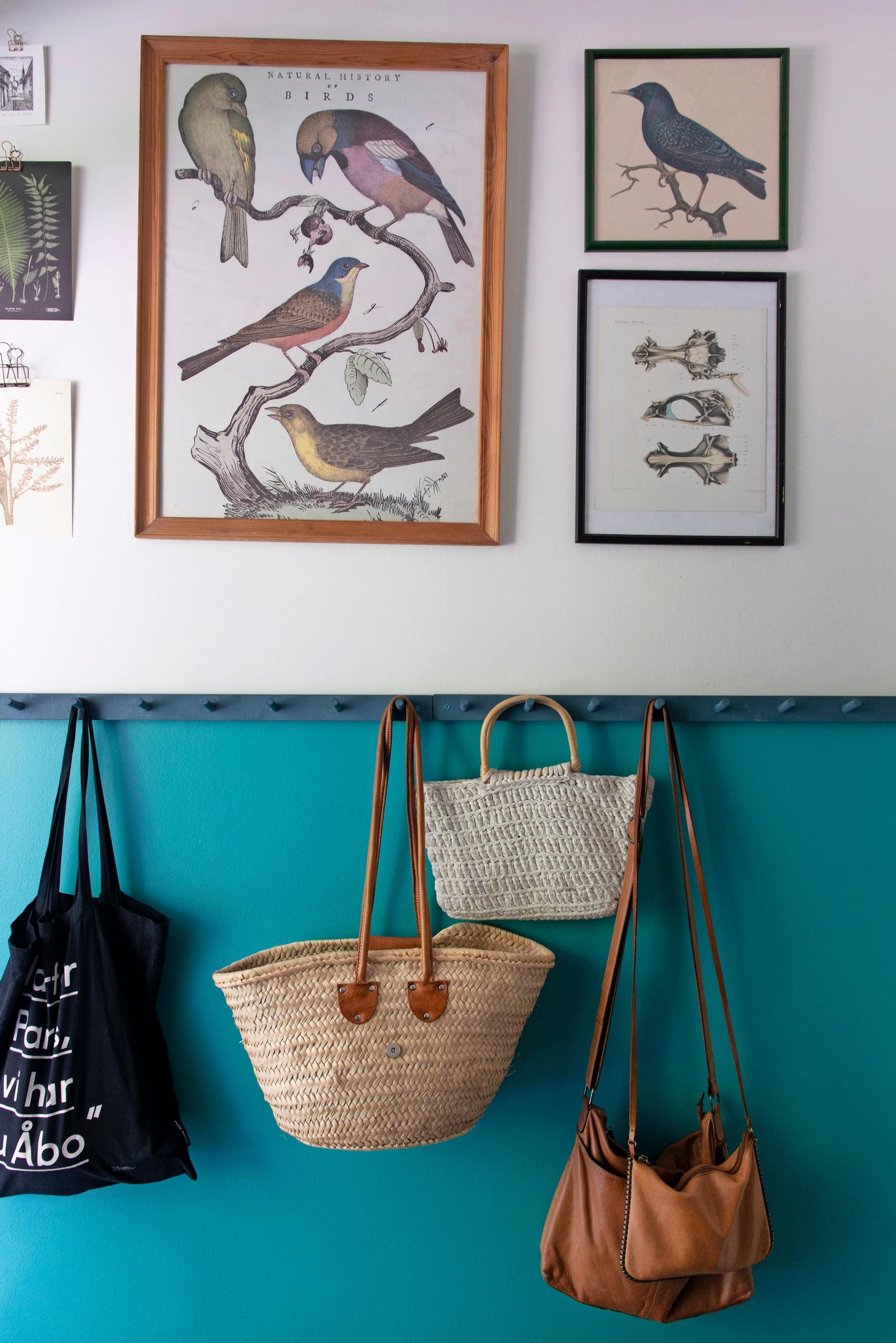 a coat rack with bags