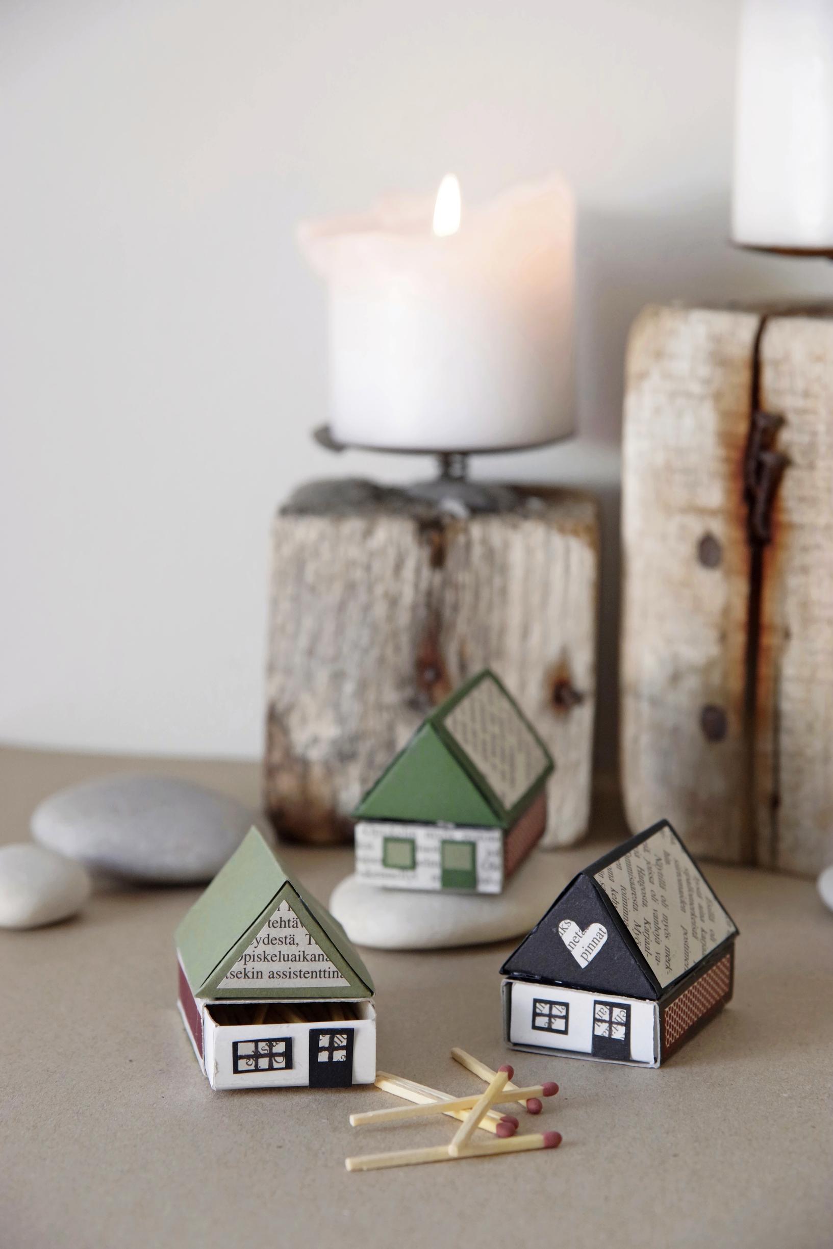 Mini houses crafted from matchboxes