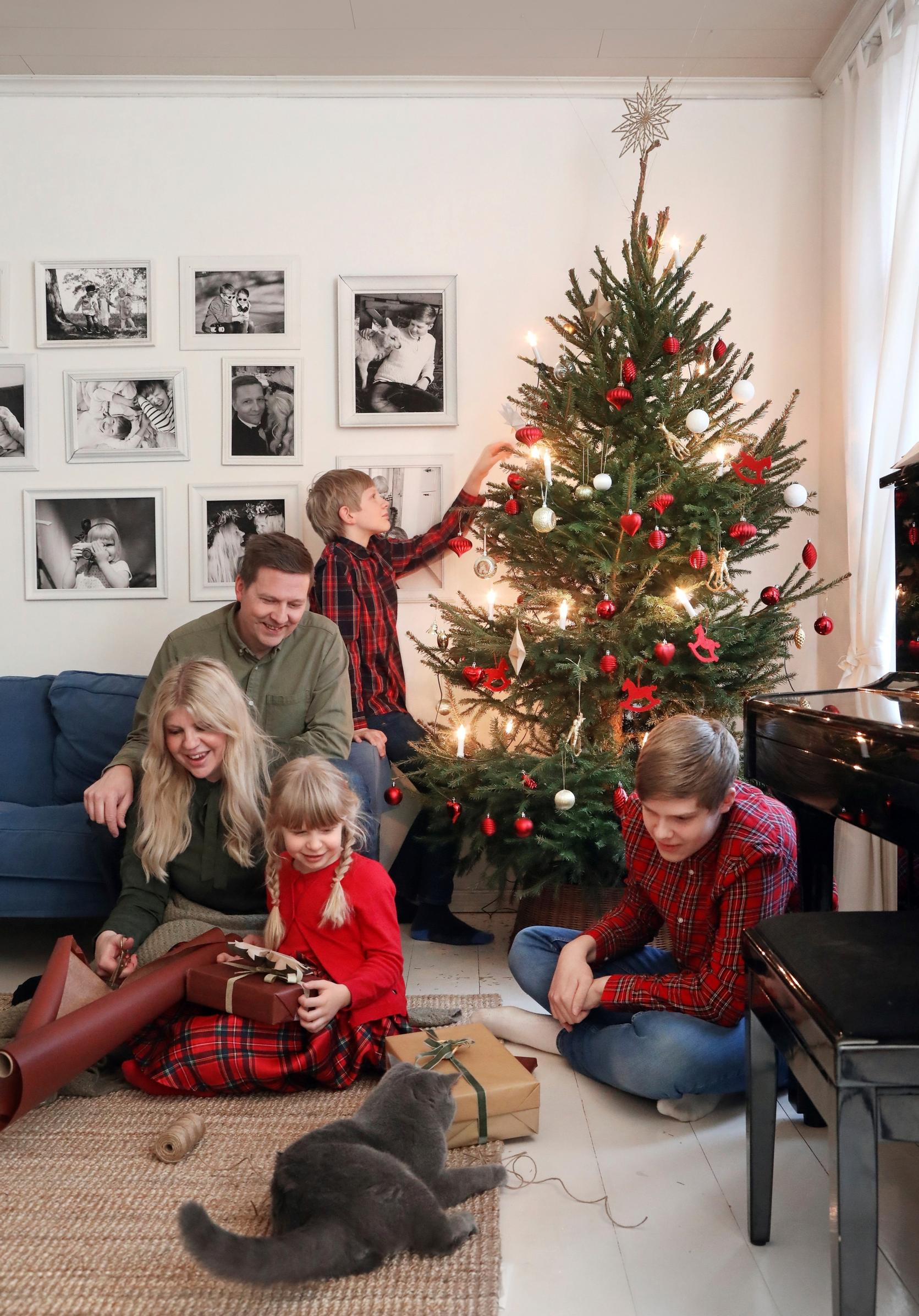 The Virta family in the living room