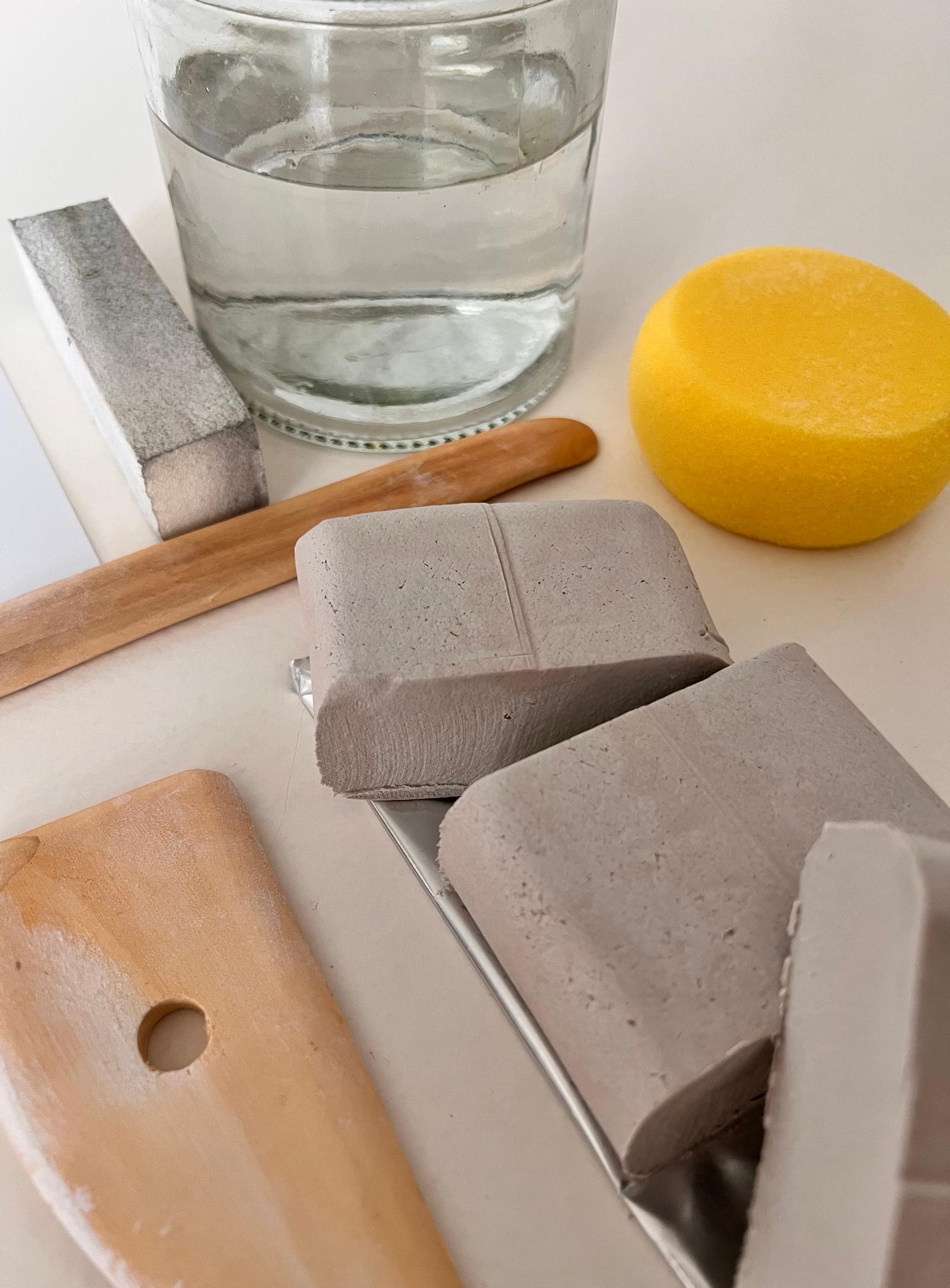 The clay is cut into pieces.