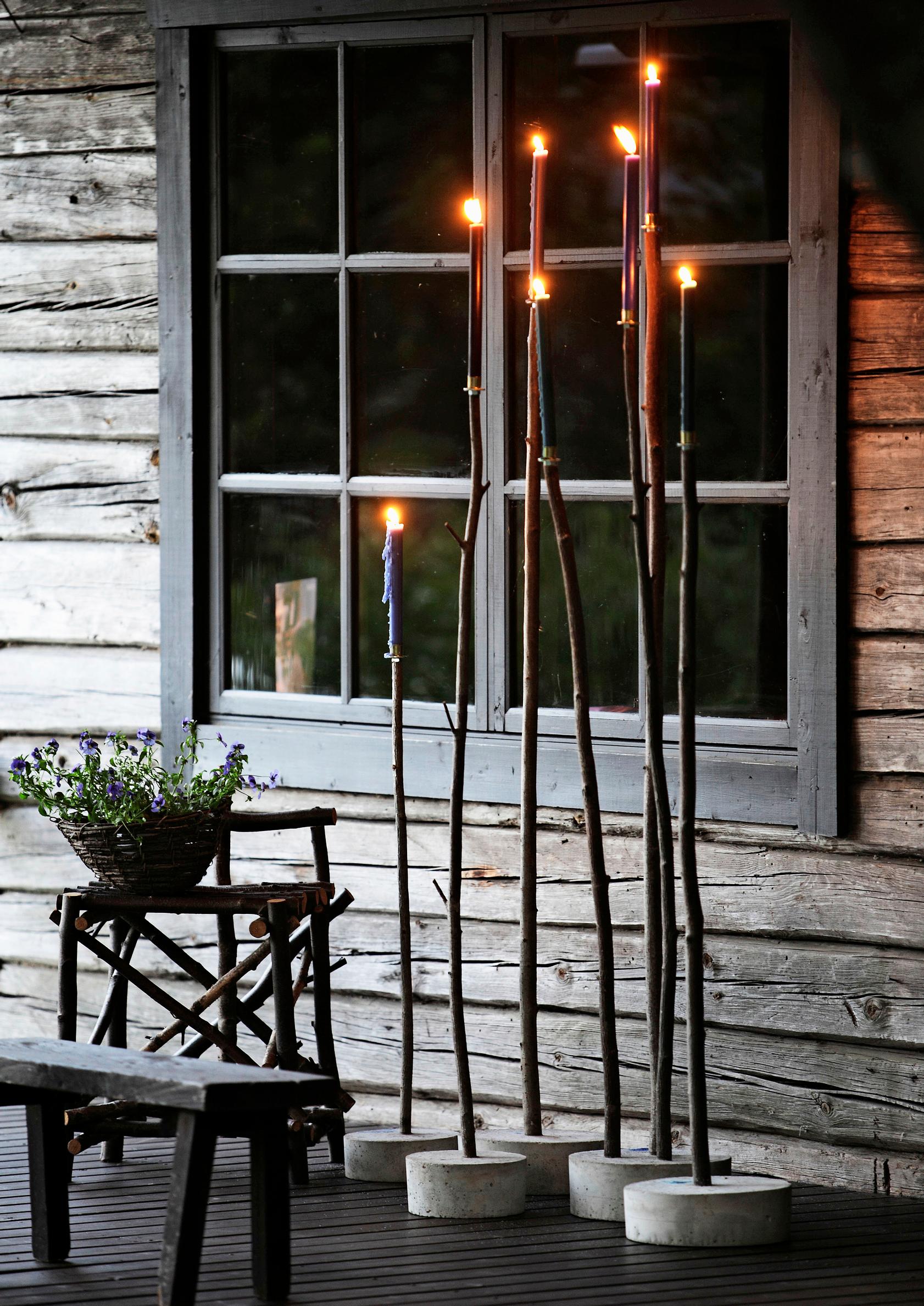 Candelabra made from concrete and branches