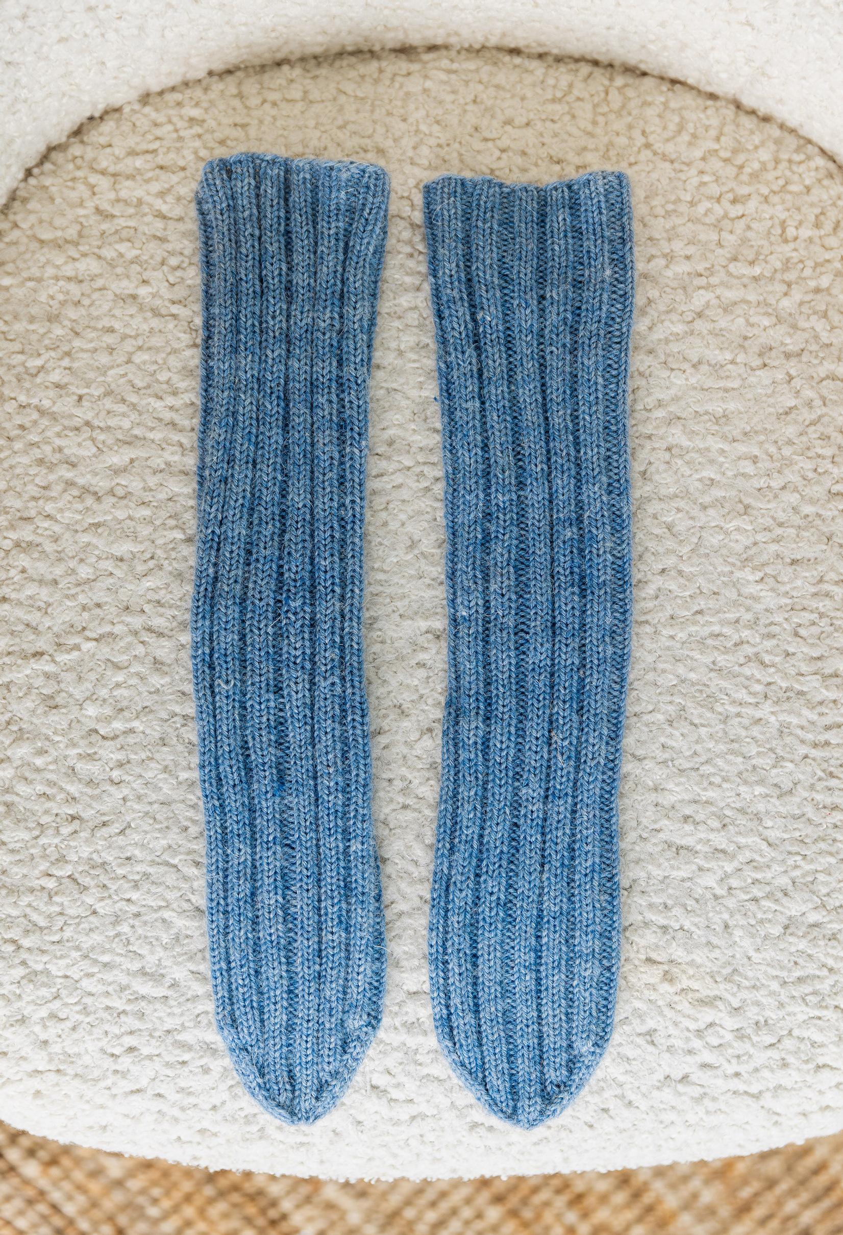 Knitted tube socks on a chair