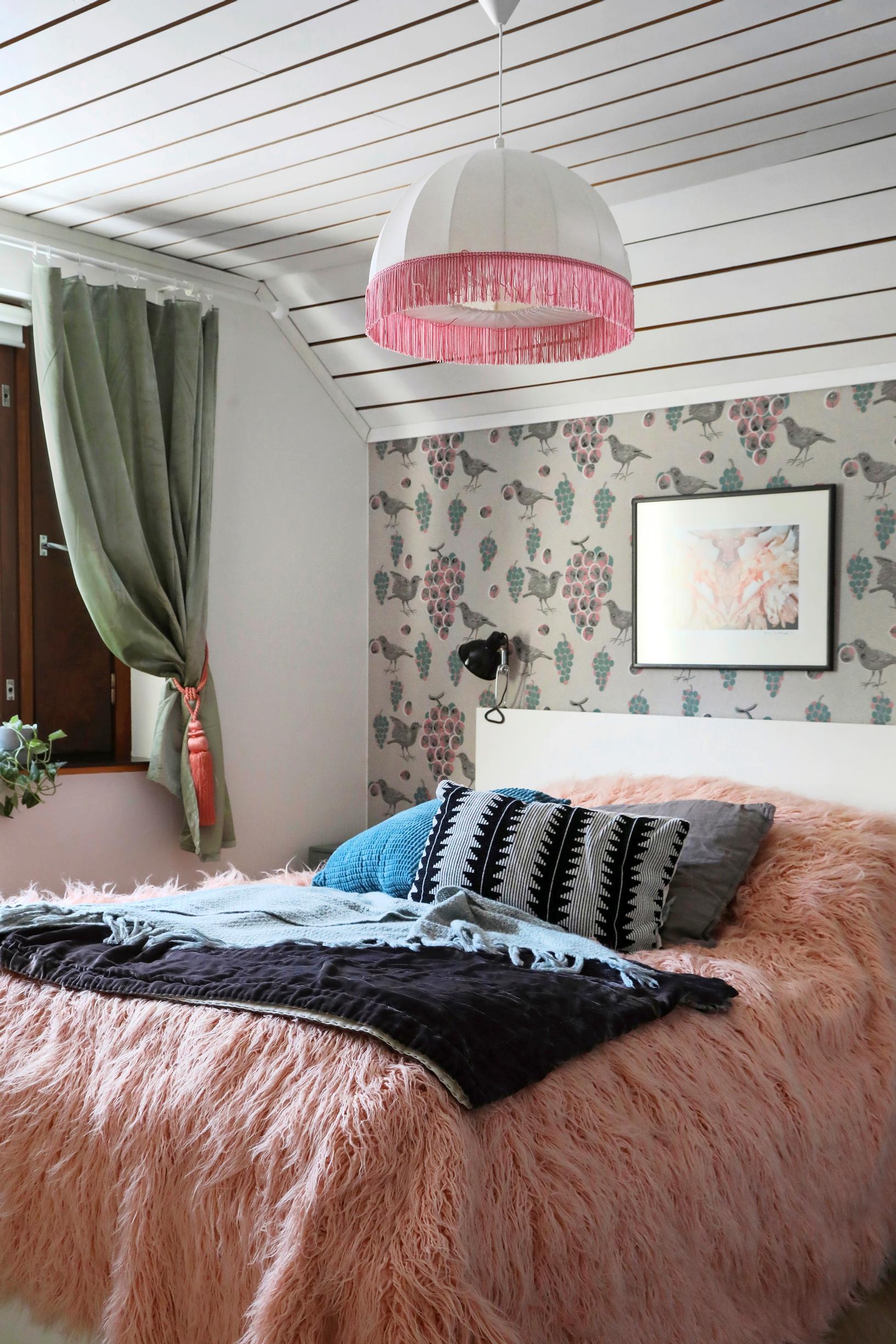 A lavishly adorned double bed