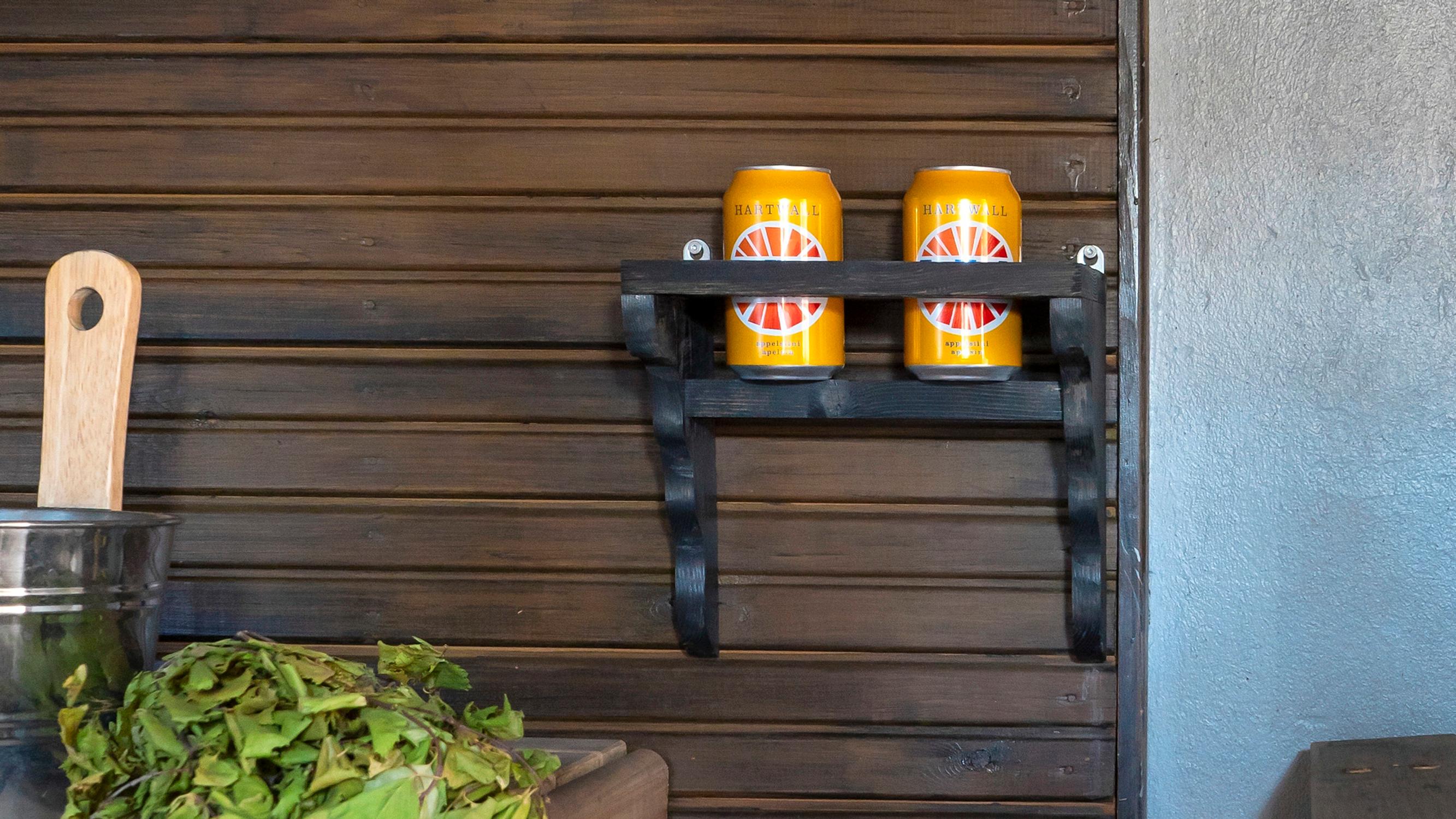 Drink holder for the sauna—make a wall-mounted wooden holder for bottles and cans