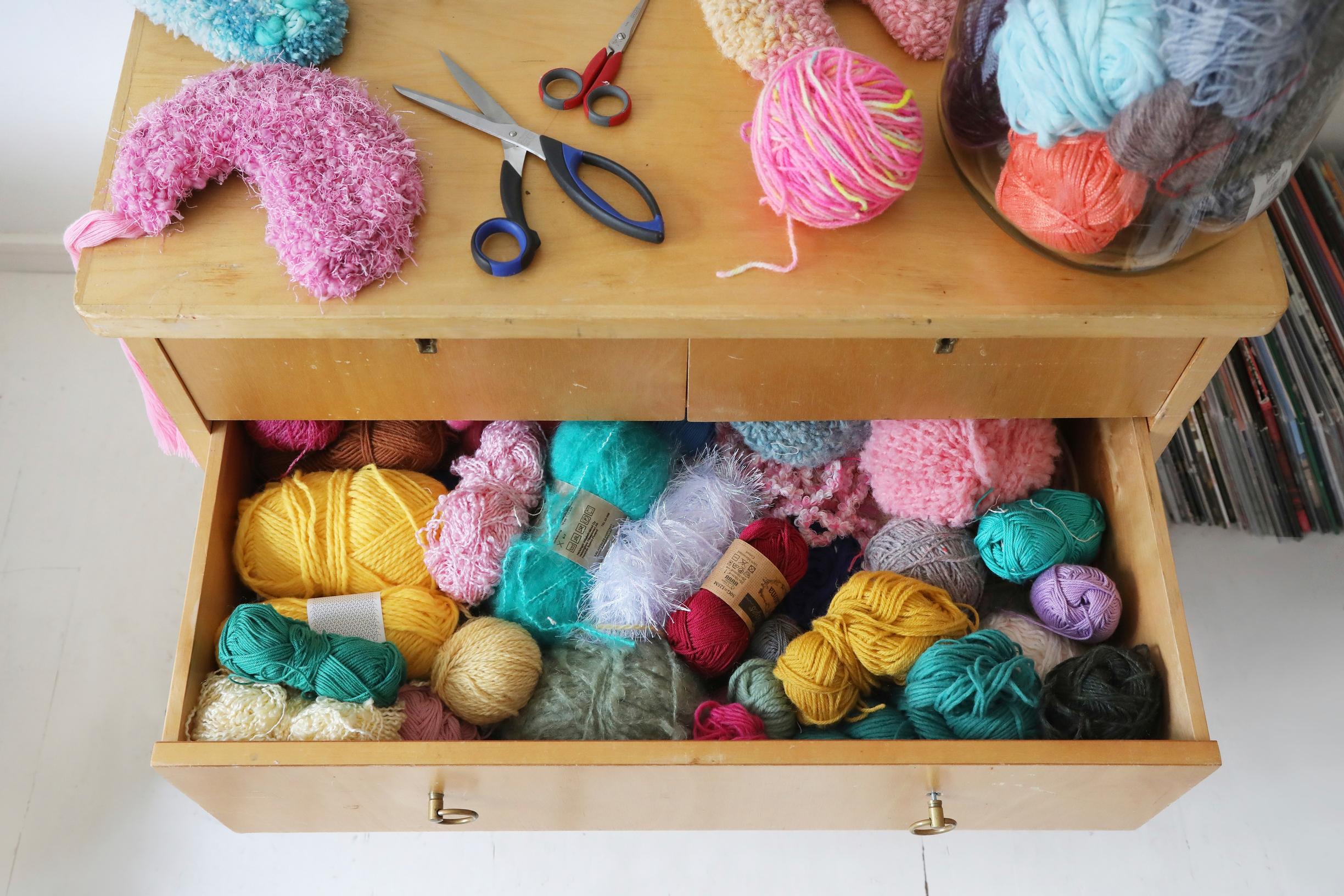 Colorful yarns in the dresser