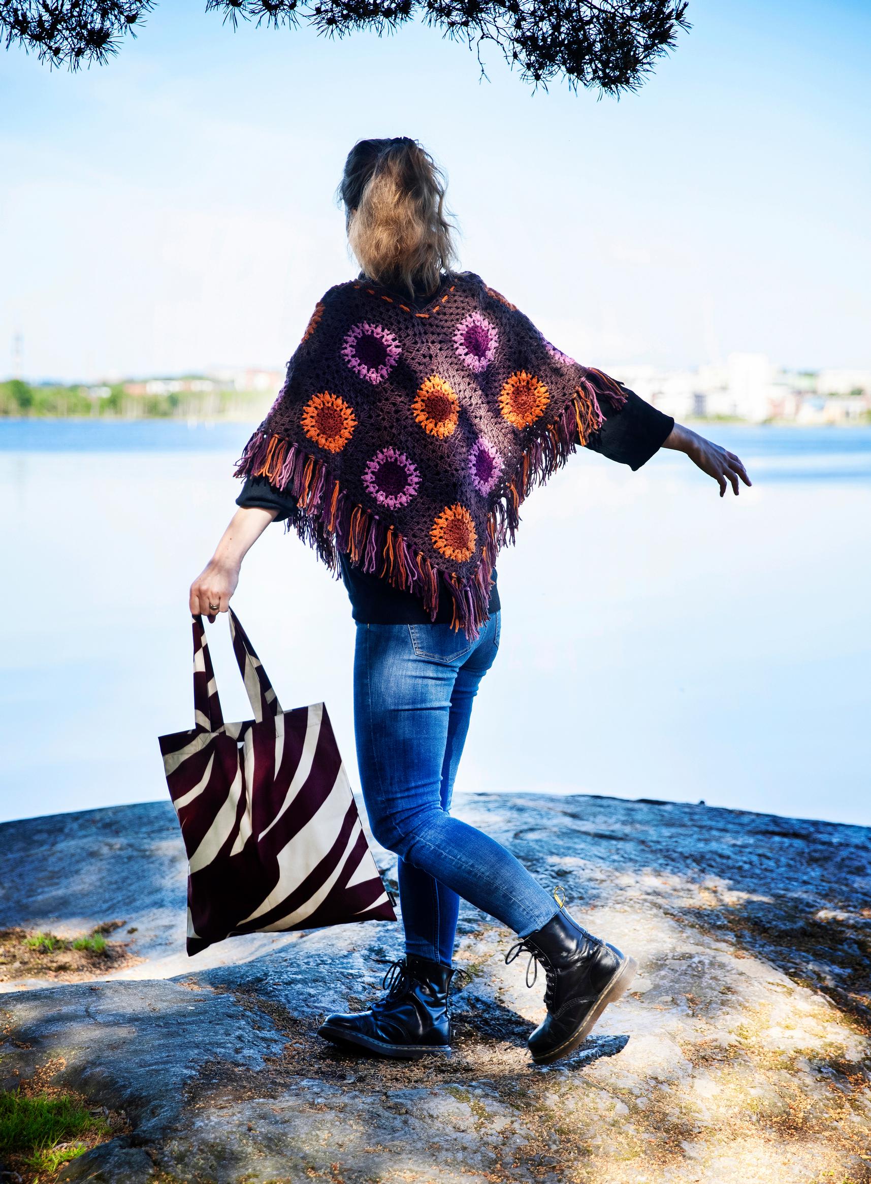 Crocheted poncho from granny squares