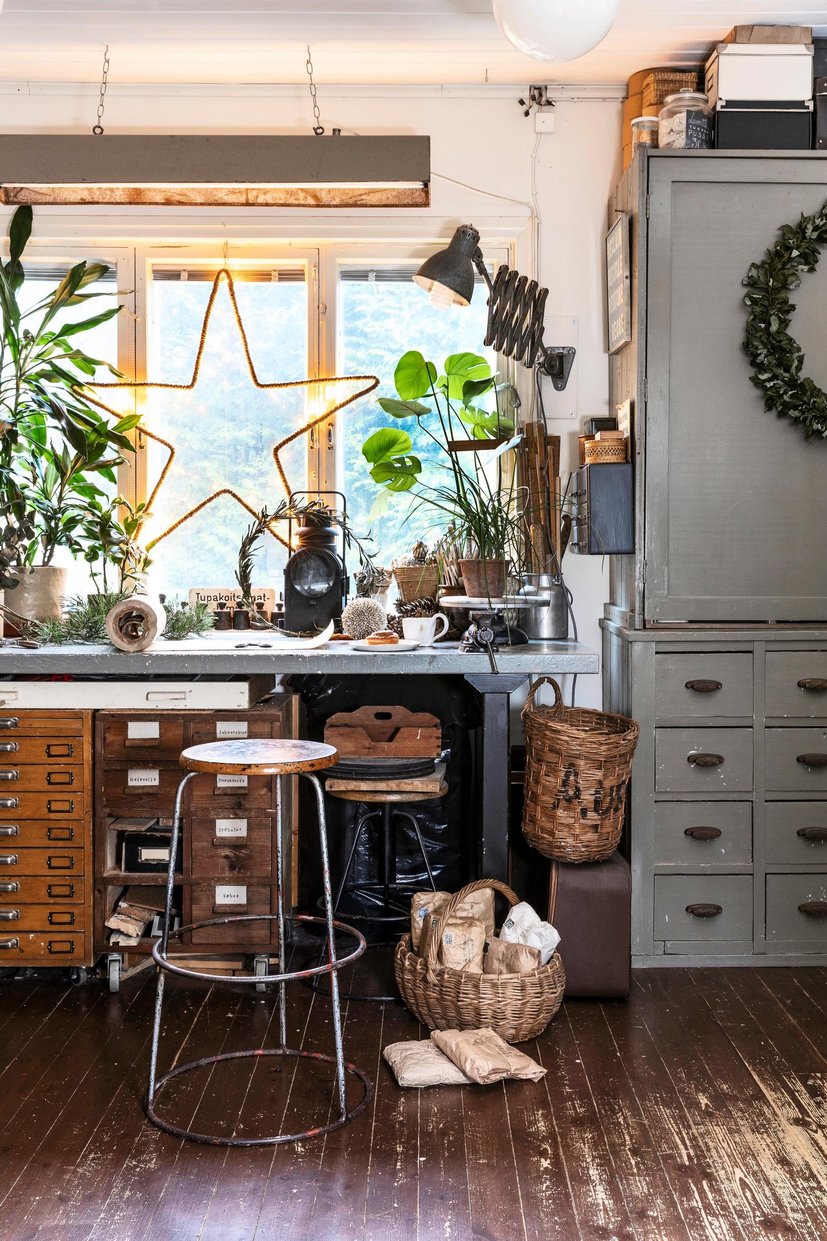 A richly decorated craft room with vintage furniture