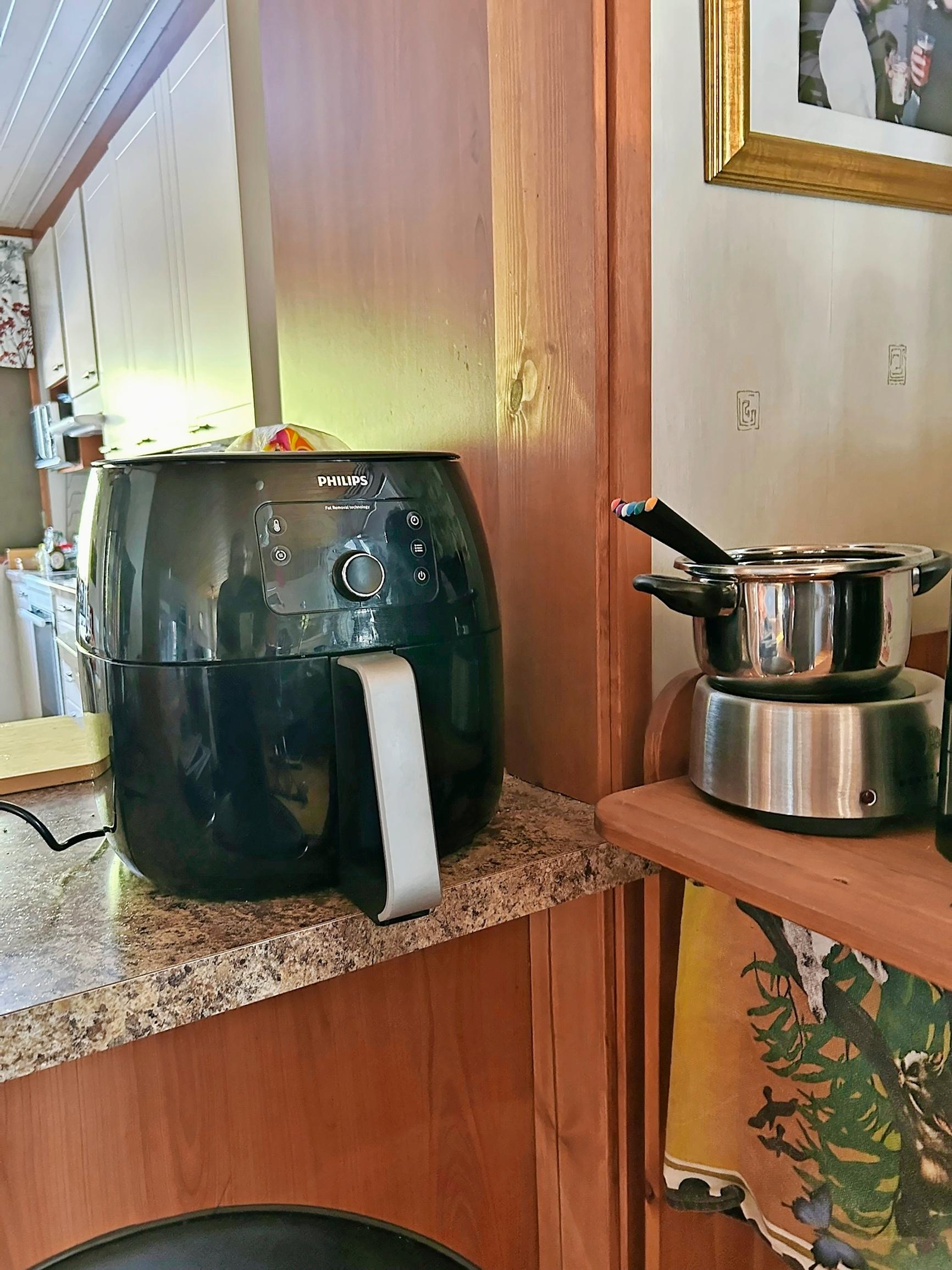An air fryer on a kitchen counter