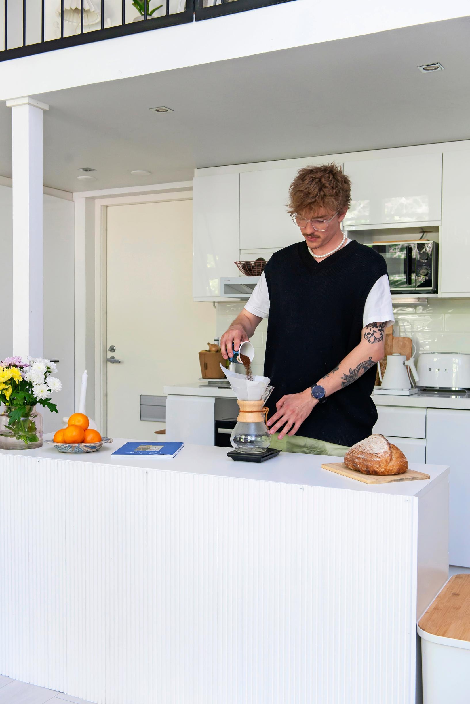 Tuomas Merkikanto making coffee