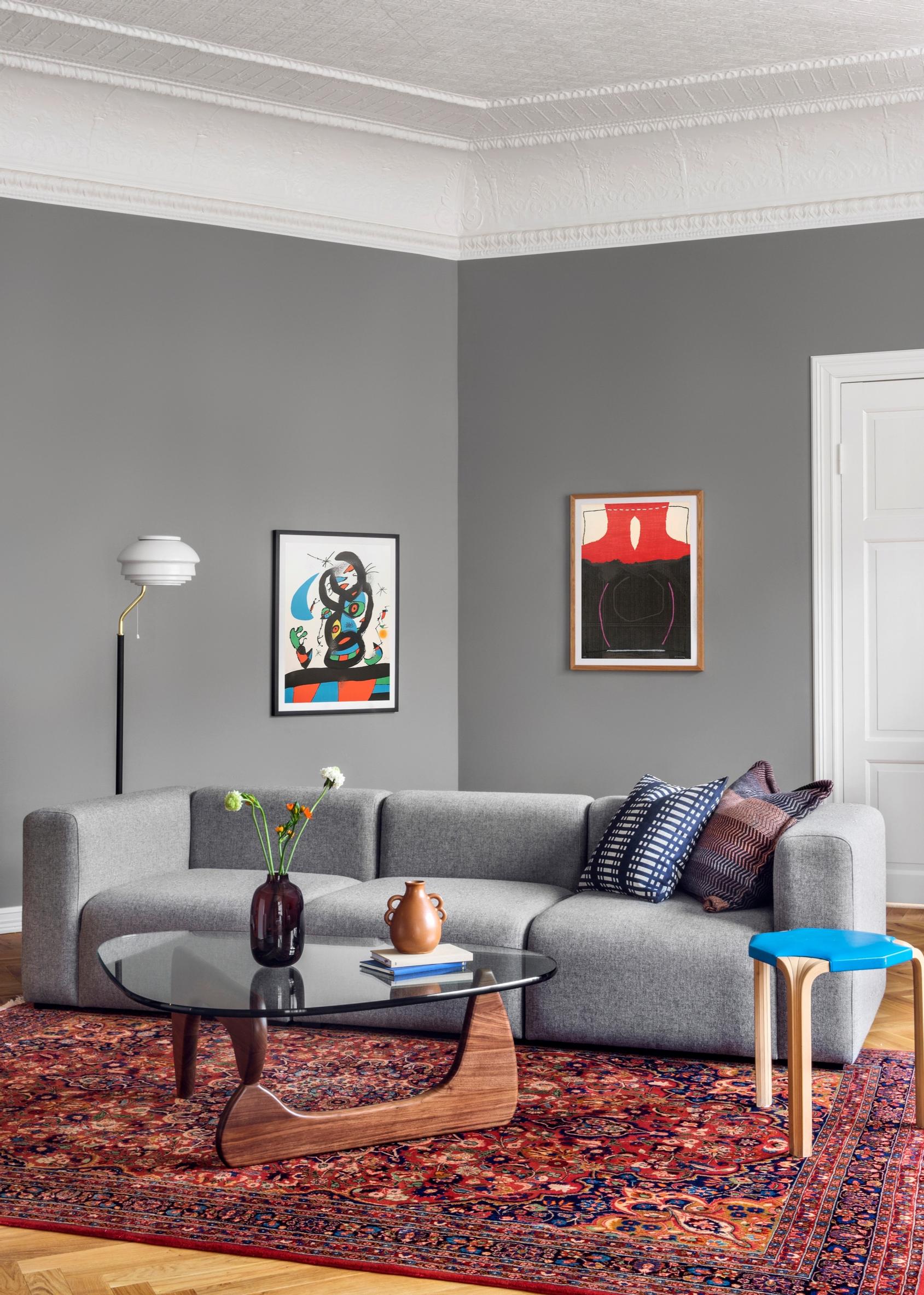 An oriental rug in a gray-toned living room