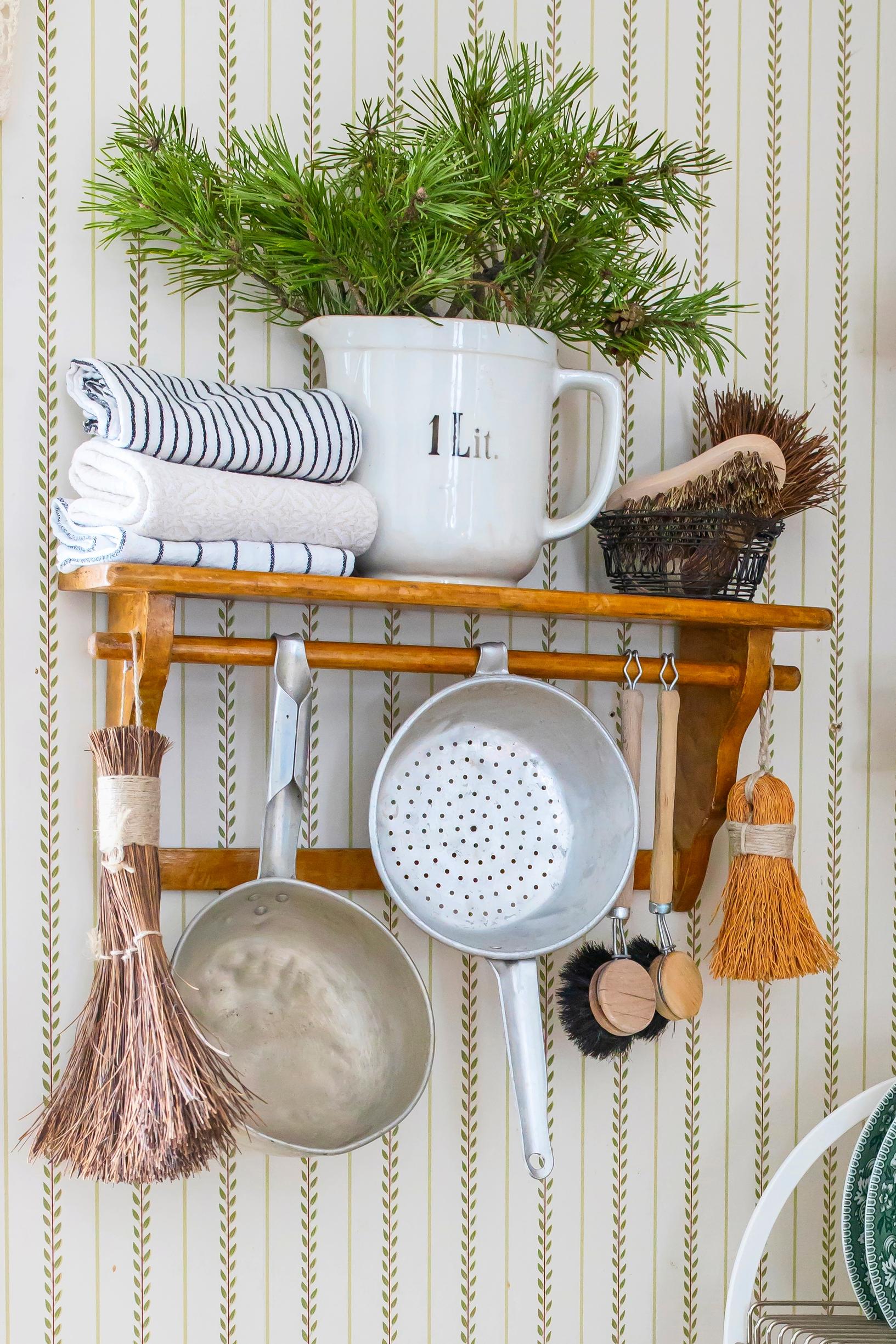 Kitchen and cleaning supplies on a shelf
