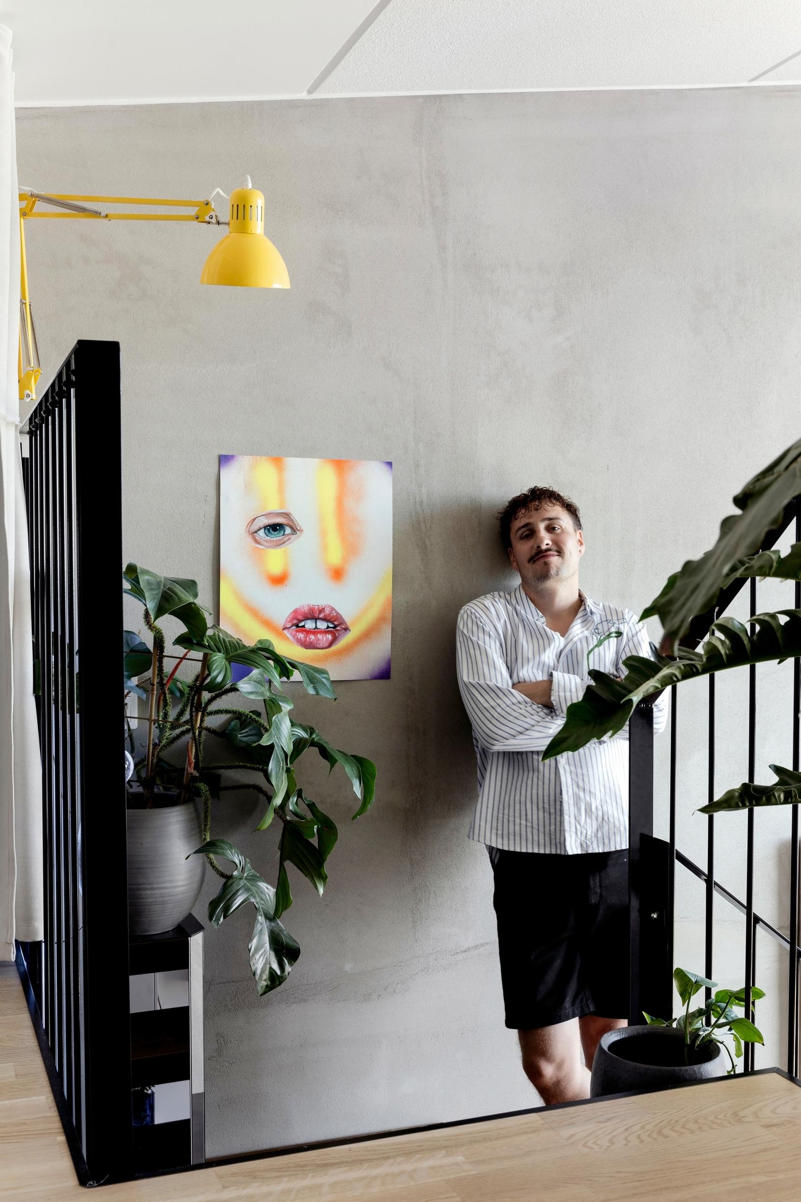 Joonas Pesonen on his home’s staircase