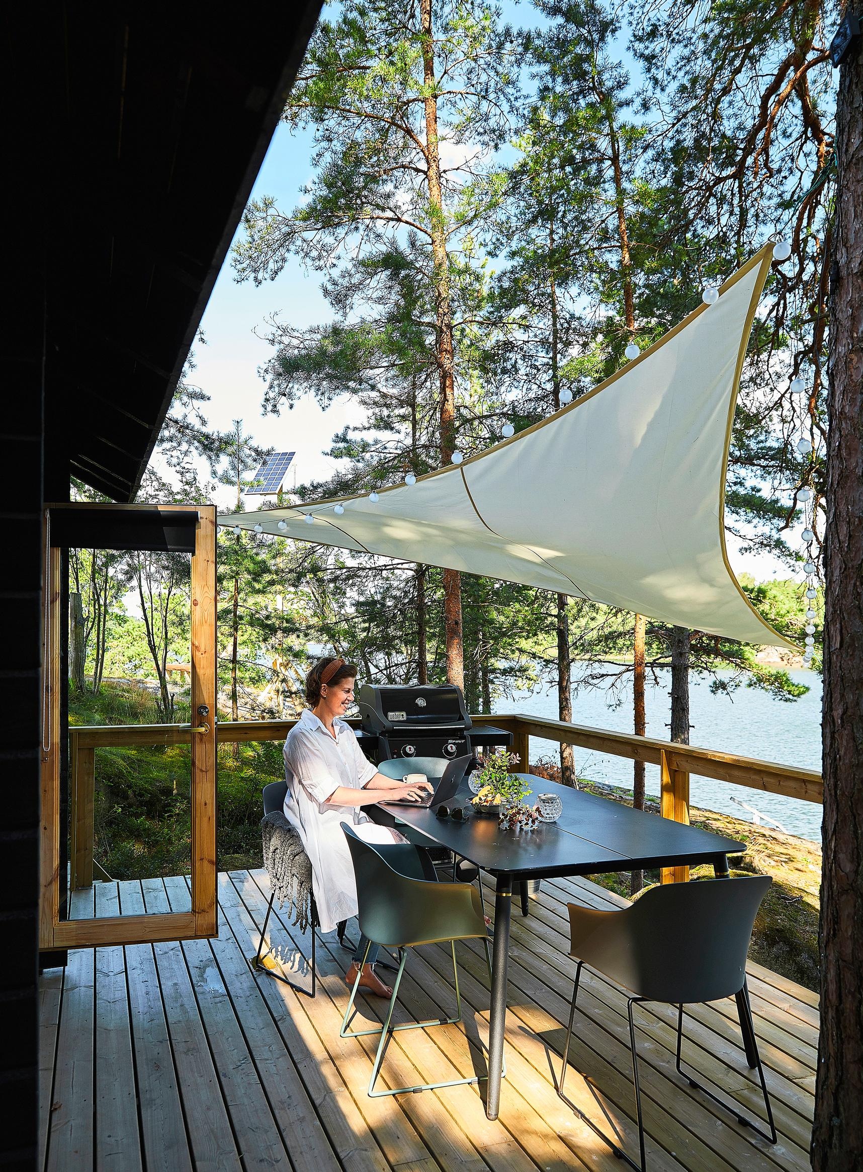 Mirka Saarinen on the cabin terrace