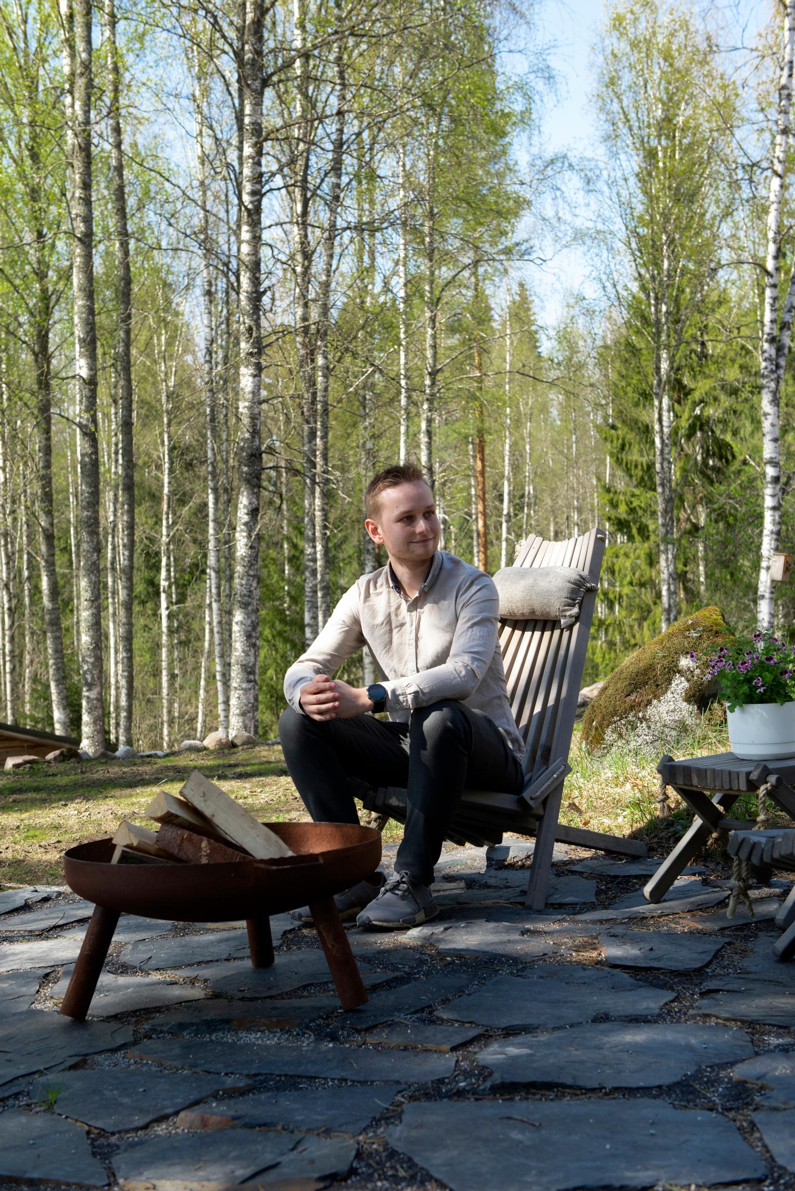 Outdoor fireplace and Valtteri on the stone patio