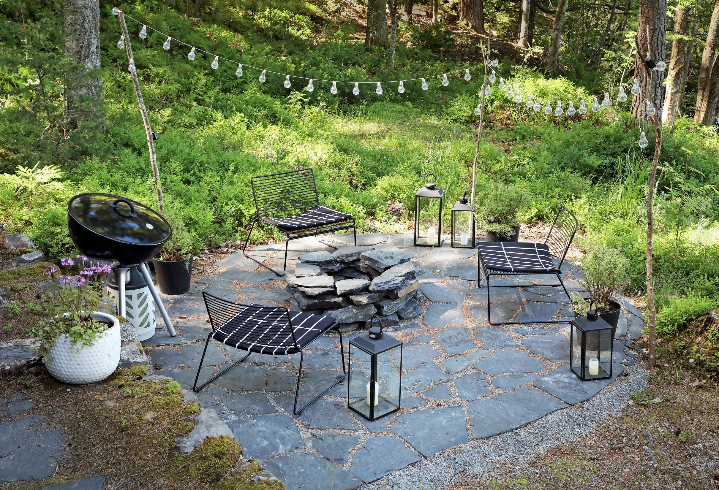 A fire pit built with slate stones