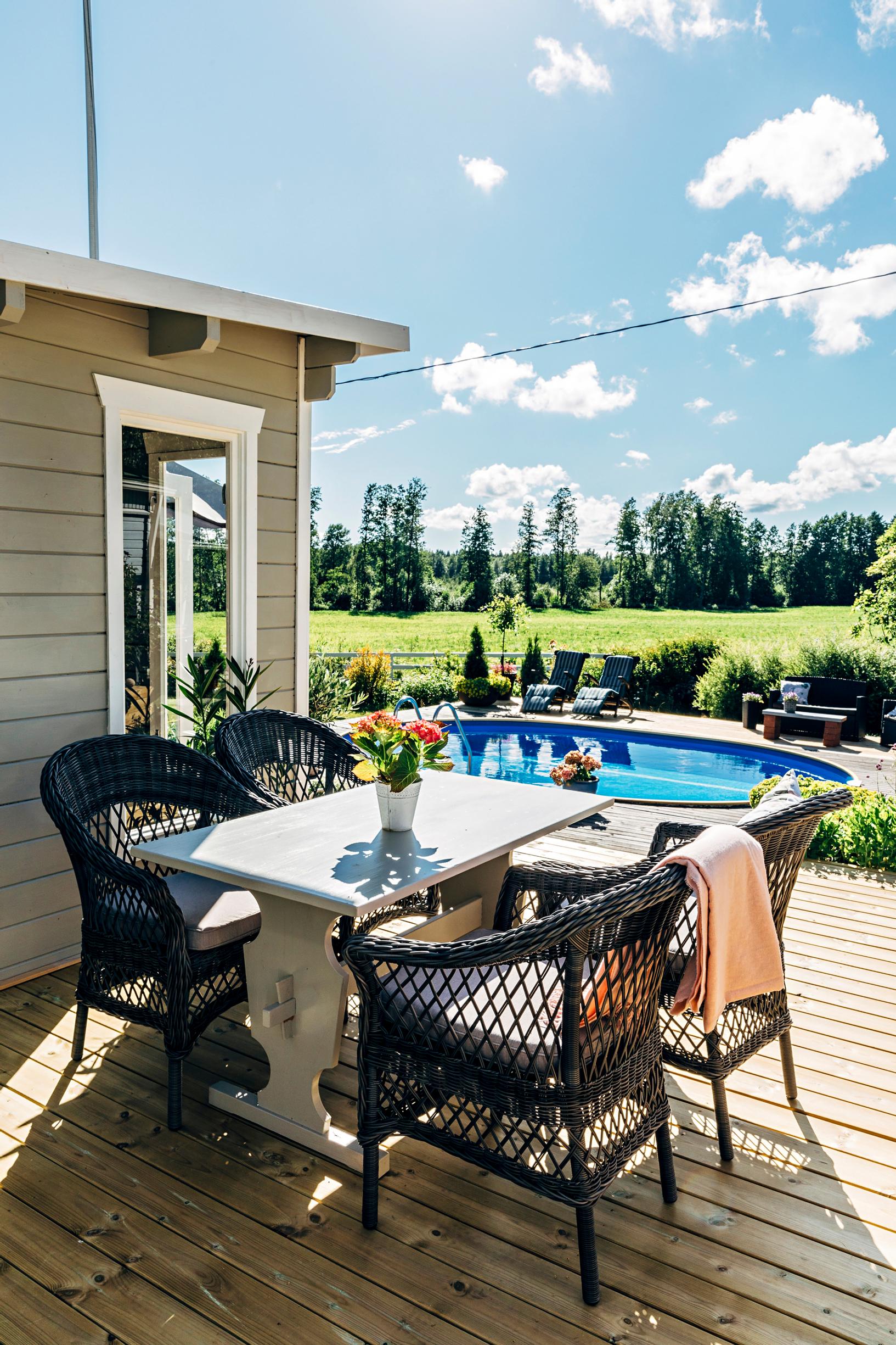 From the deck, you can see the pool and the field