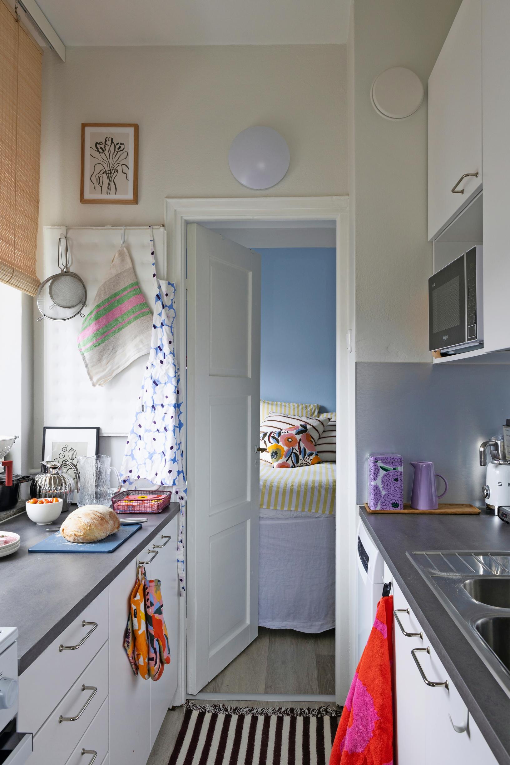 Galley-style kitchen with a window