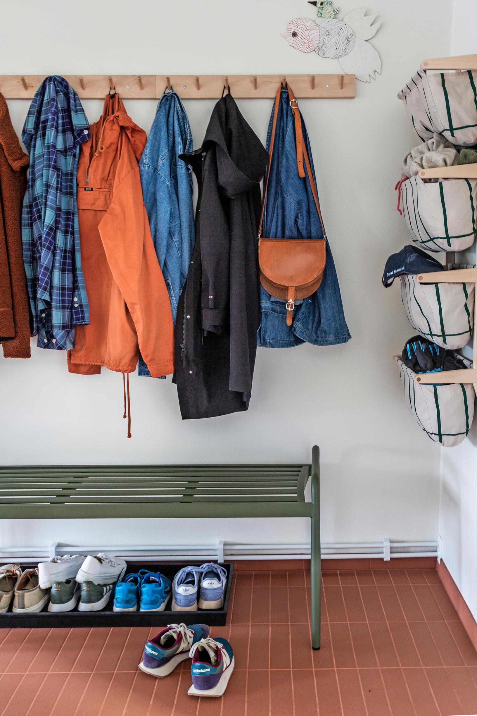 An entryway coat rack built for many coats.