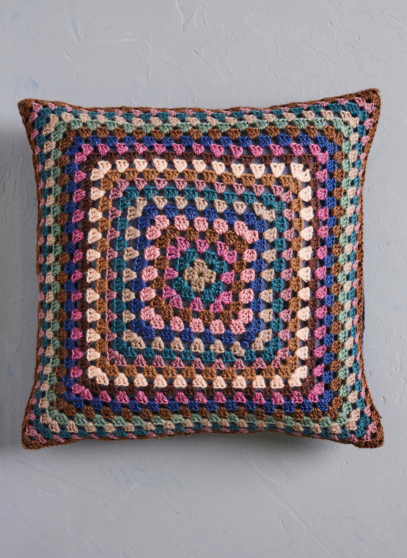 Crocheted granny square pillow