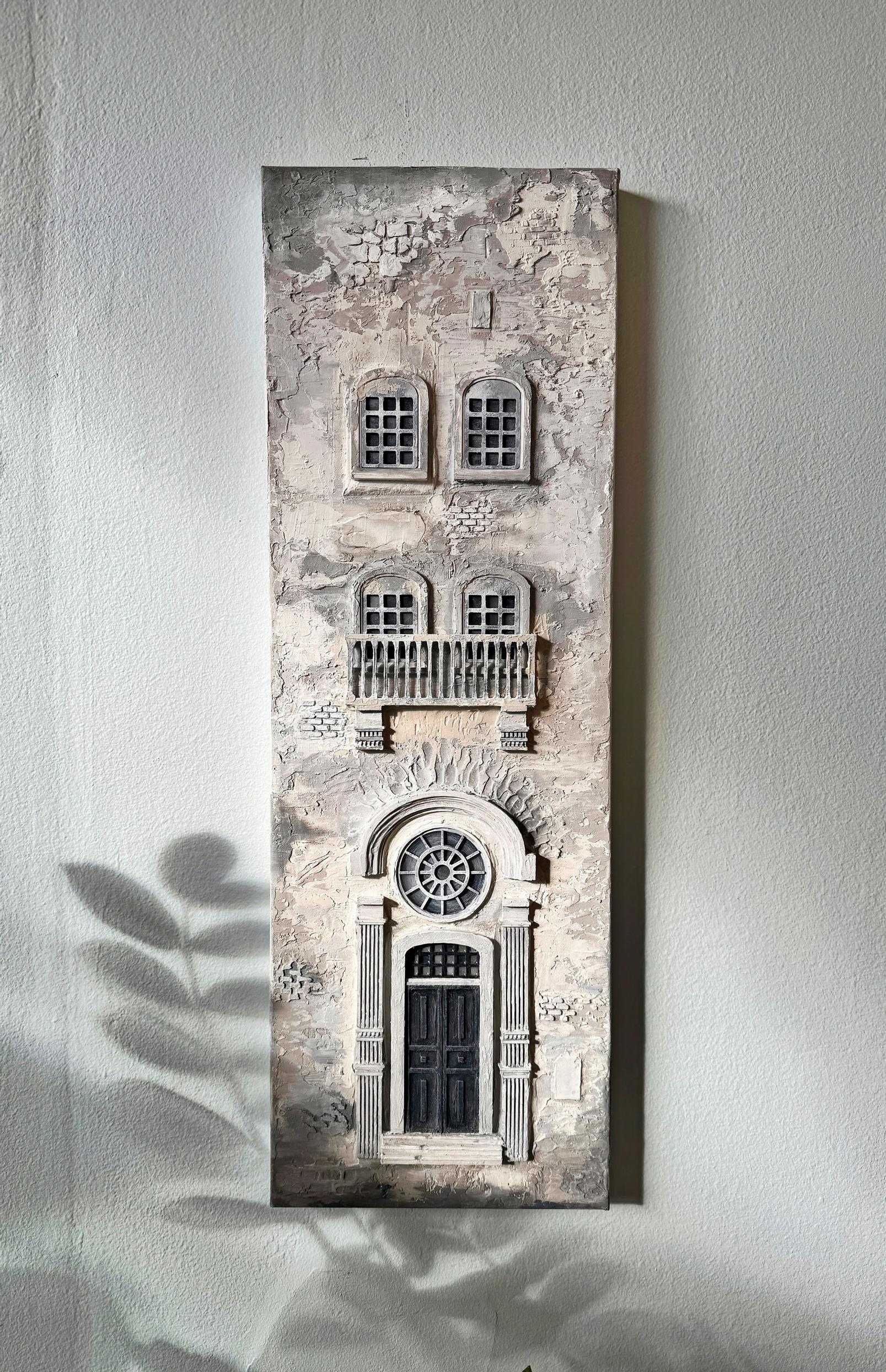 A finished scale model of a facade.