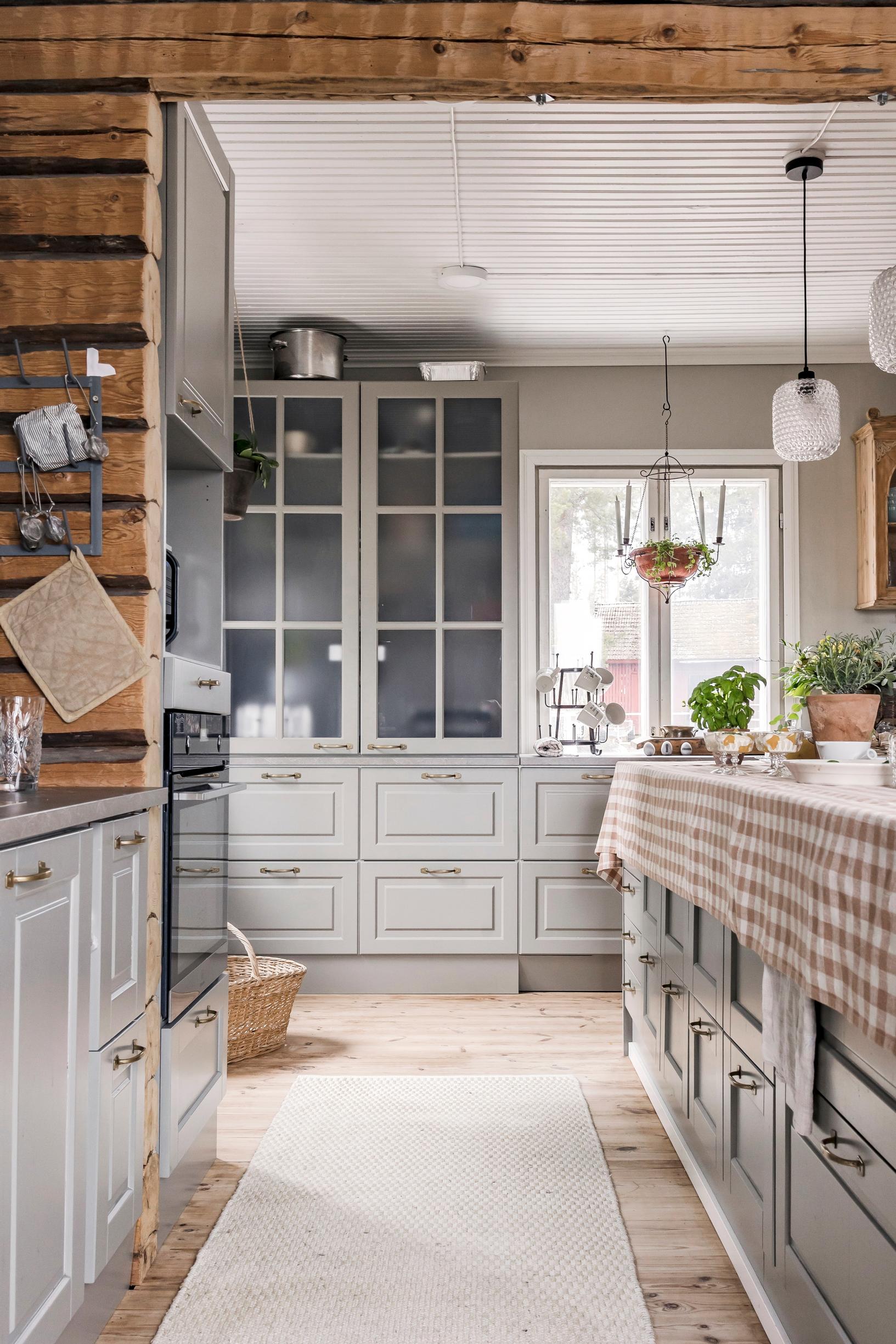 A gray kitchen with a large island