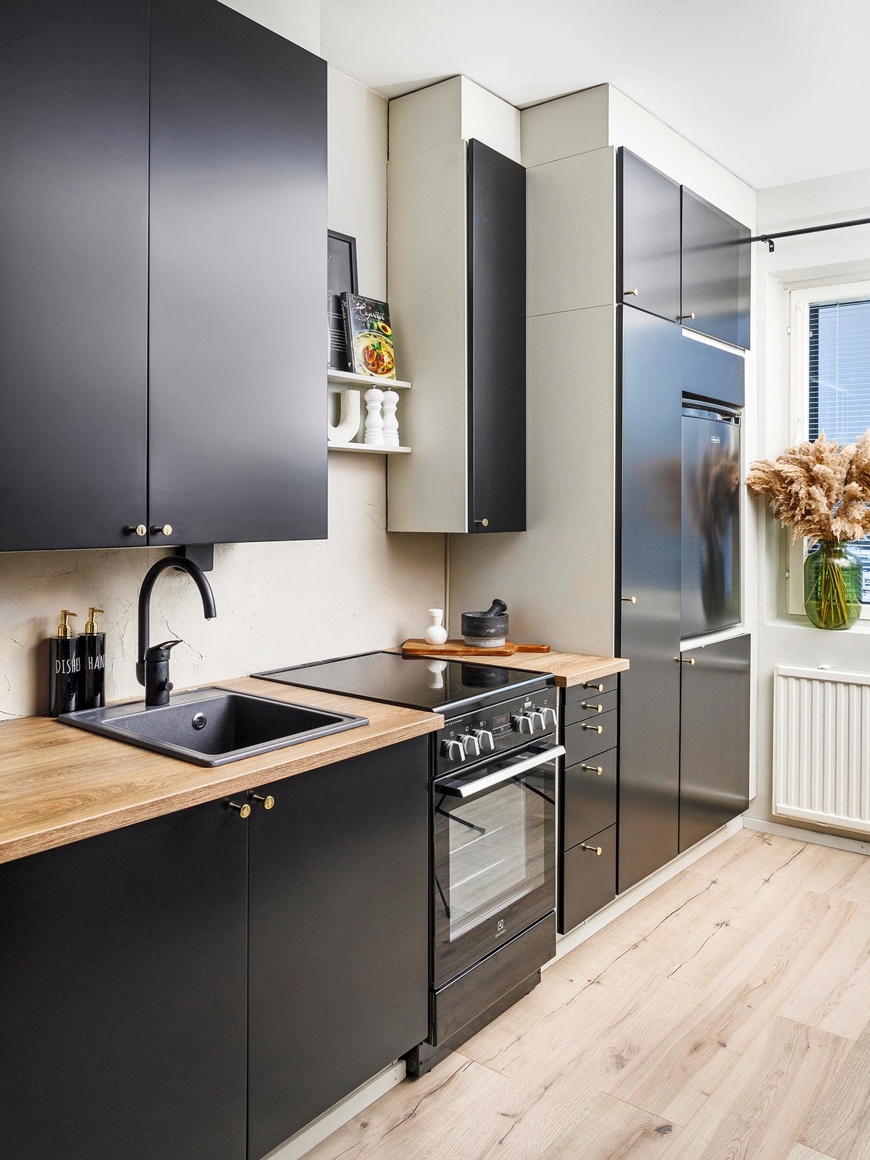 Sarita refurbished her kitchen on a small budget—would you believe these cabinets are 50 years old?