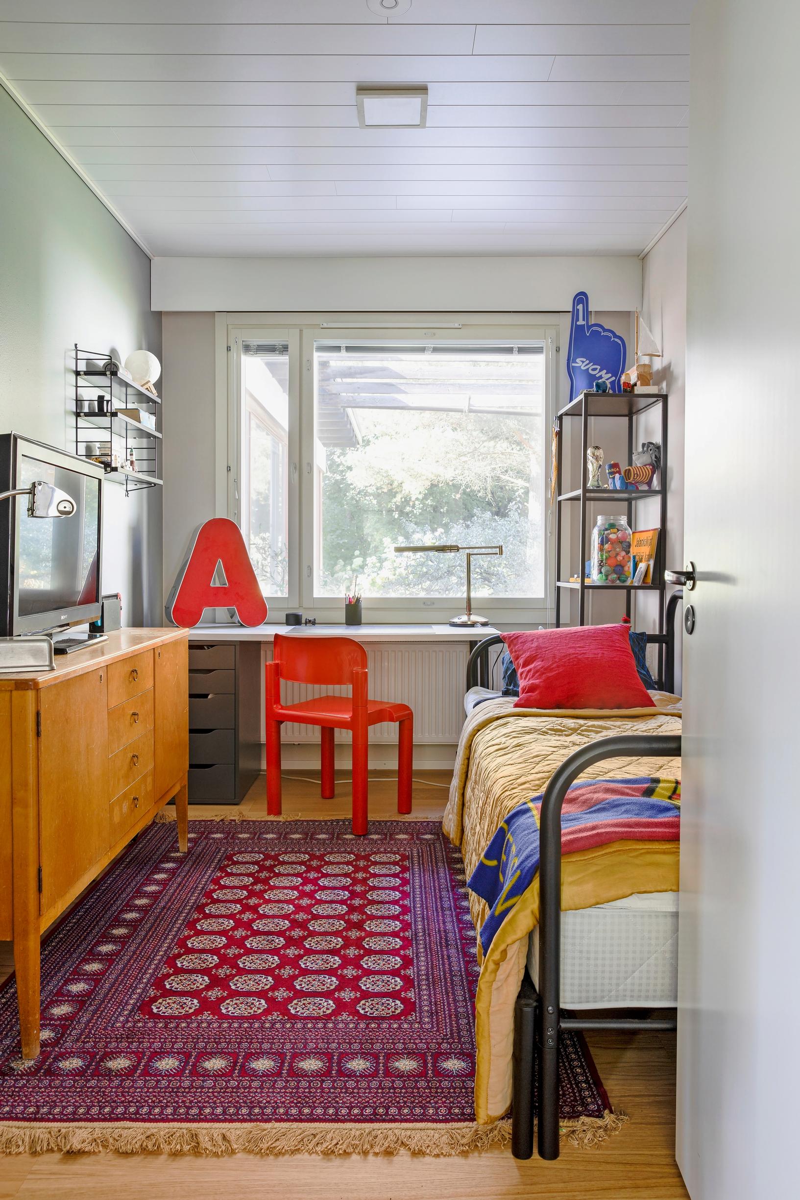 Photo of the children’s room featuring thrifted items and cheerful colors.