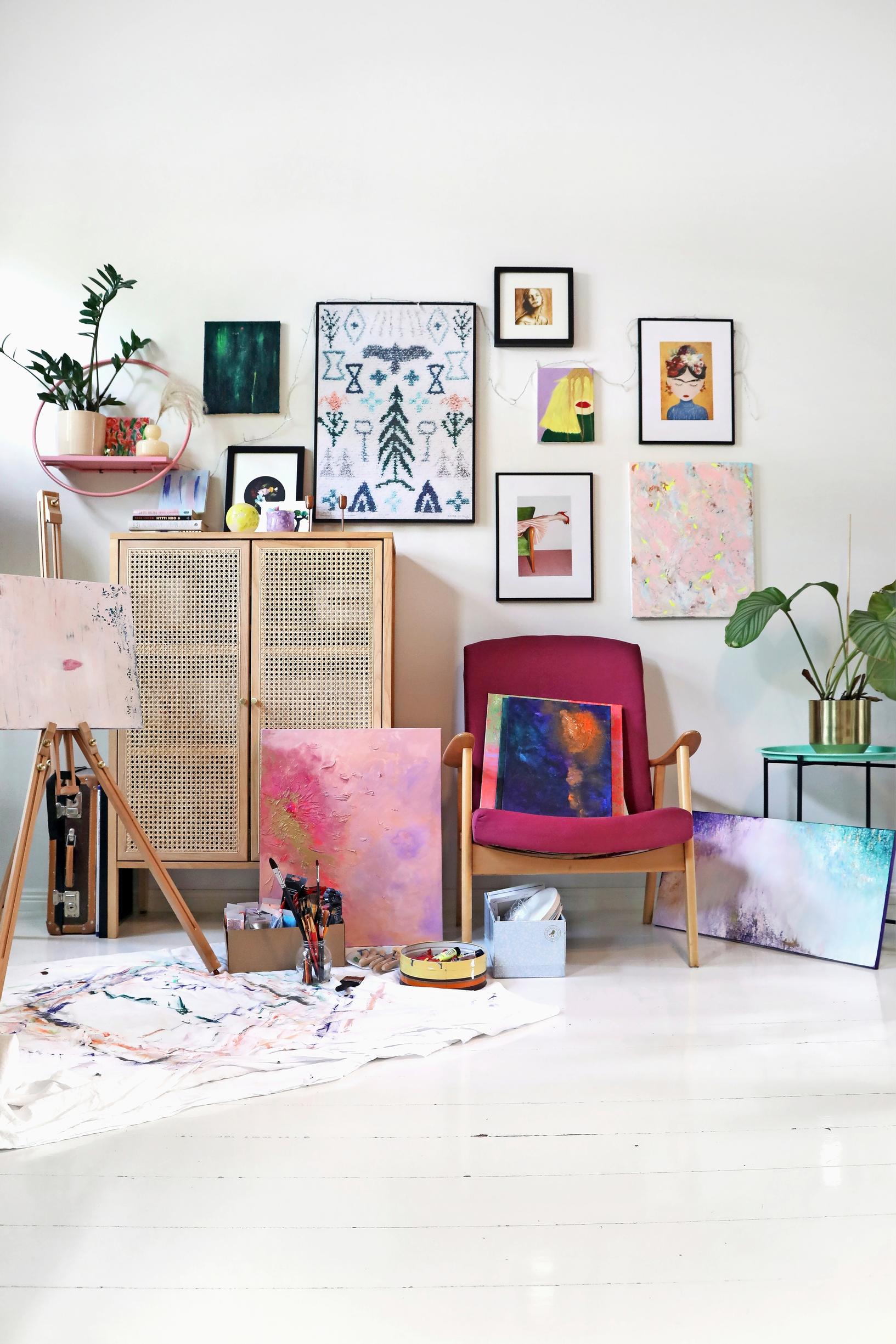 A photo of the art corner in the living room of an old wooden home.
