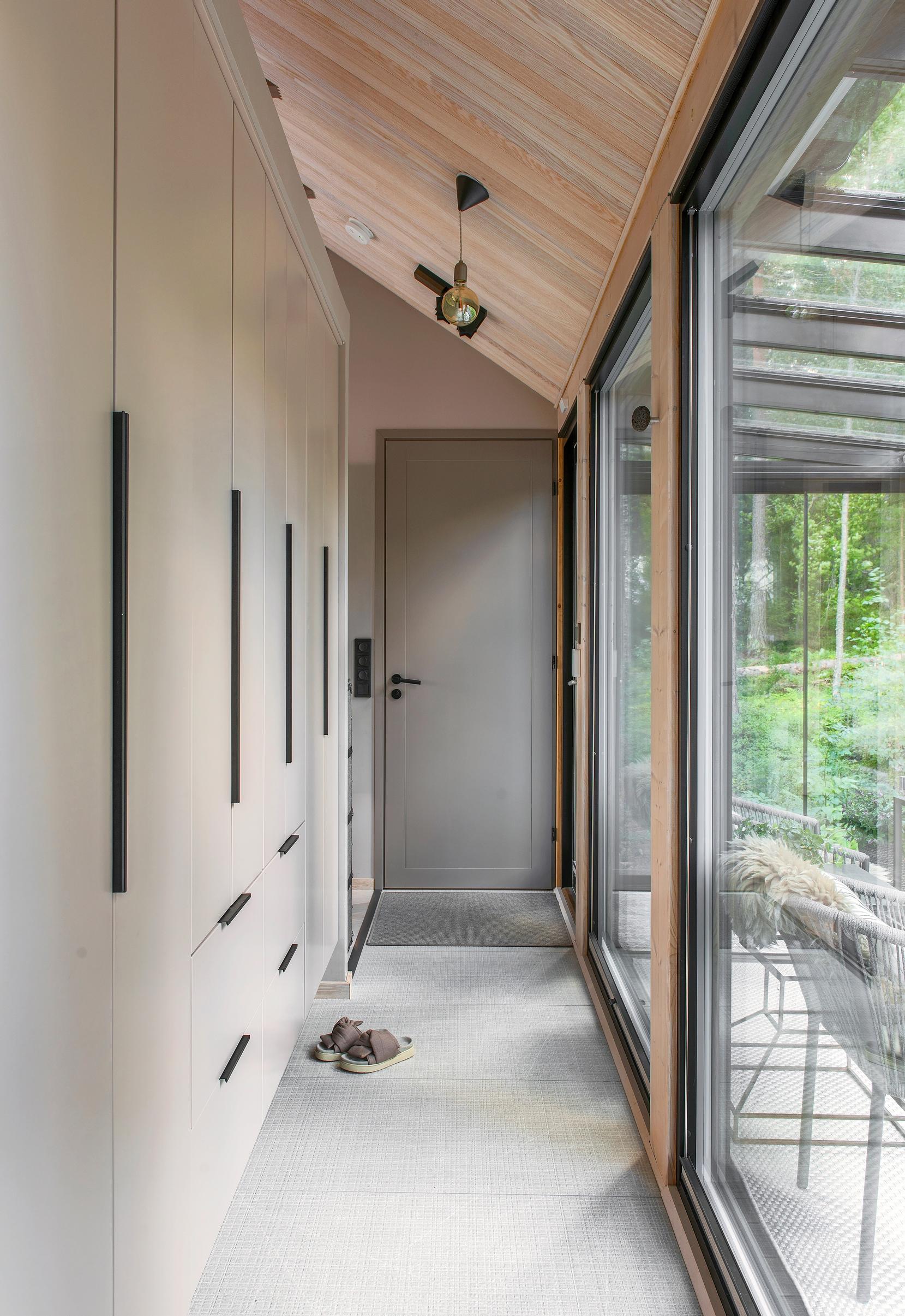 Closets in a narrow entry hallway