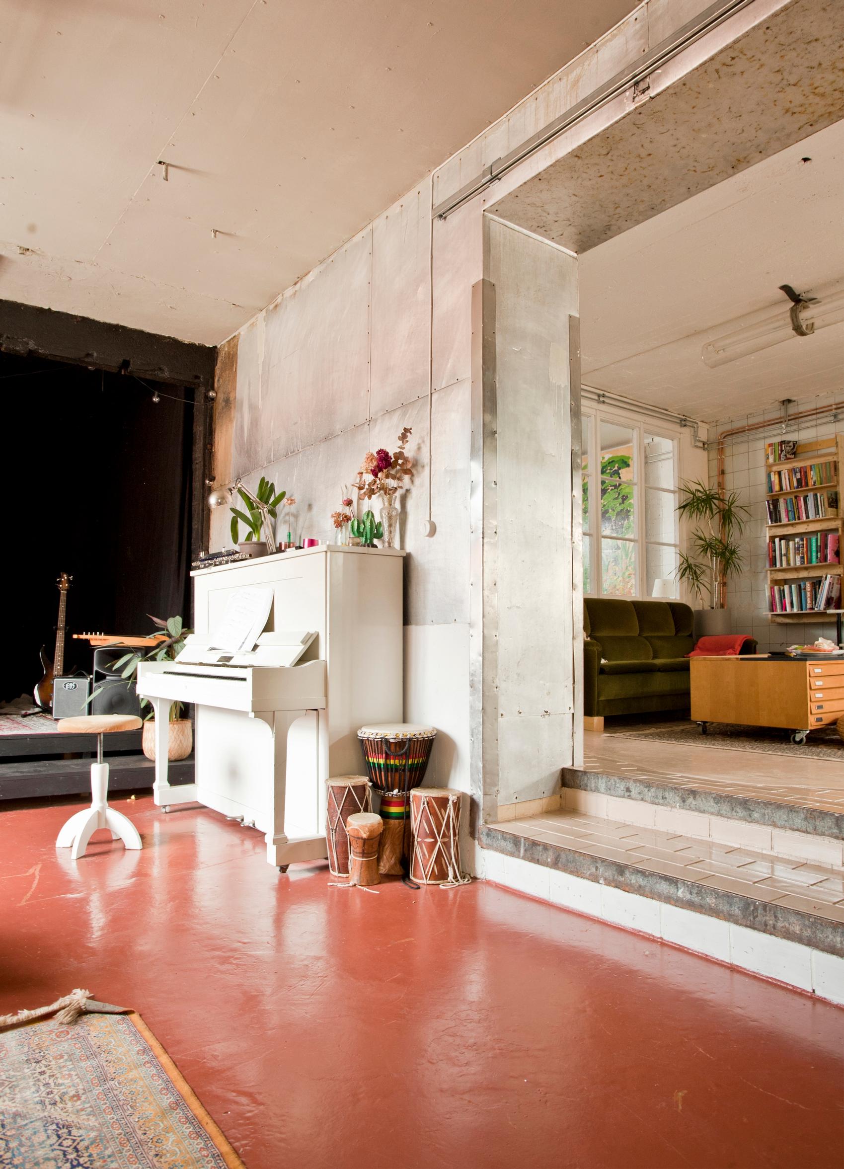 A piano and small performance stage