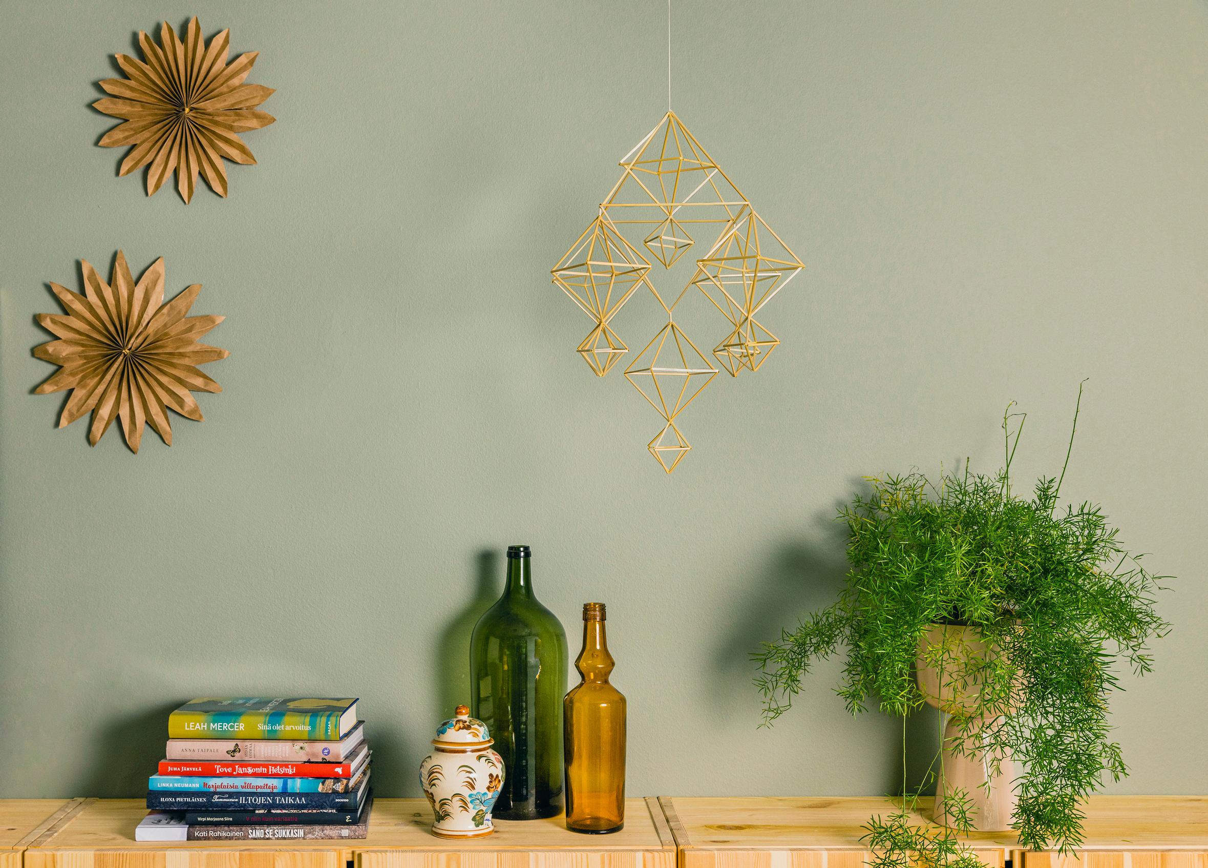 A finished straw mobile hung up