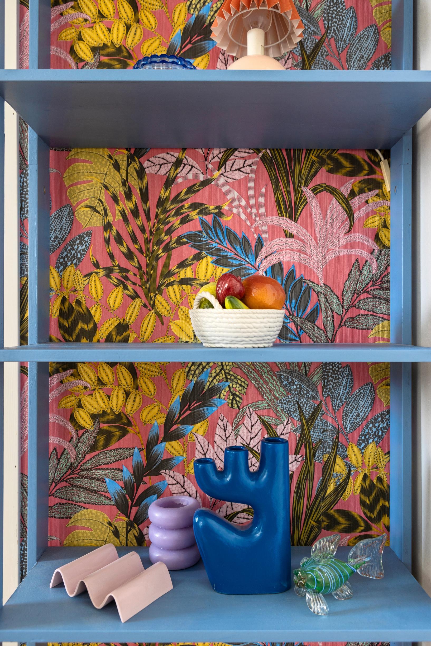 A shelf painted blue.