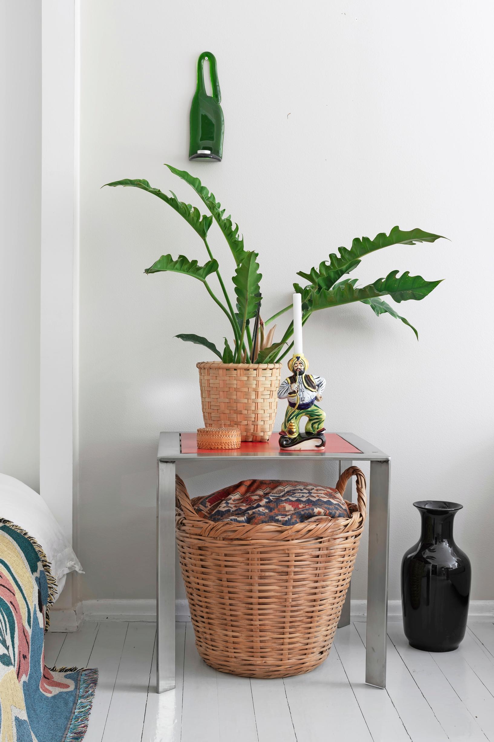 Metal table used as a plant stand