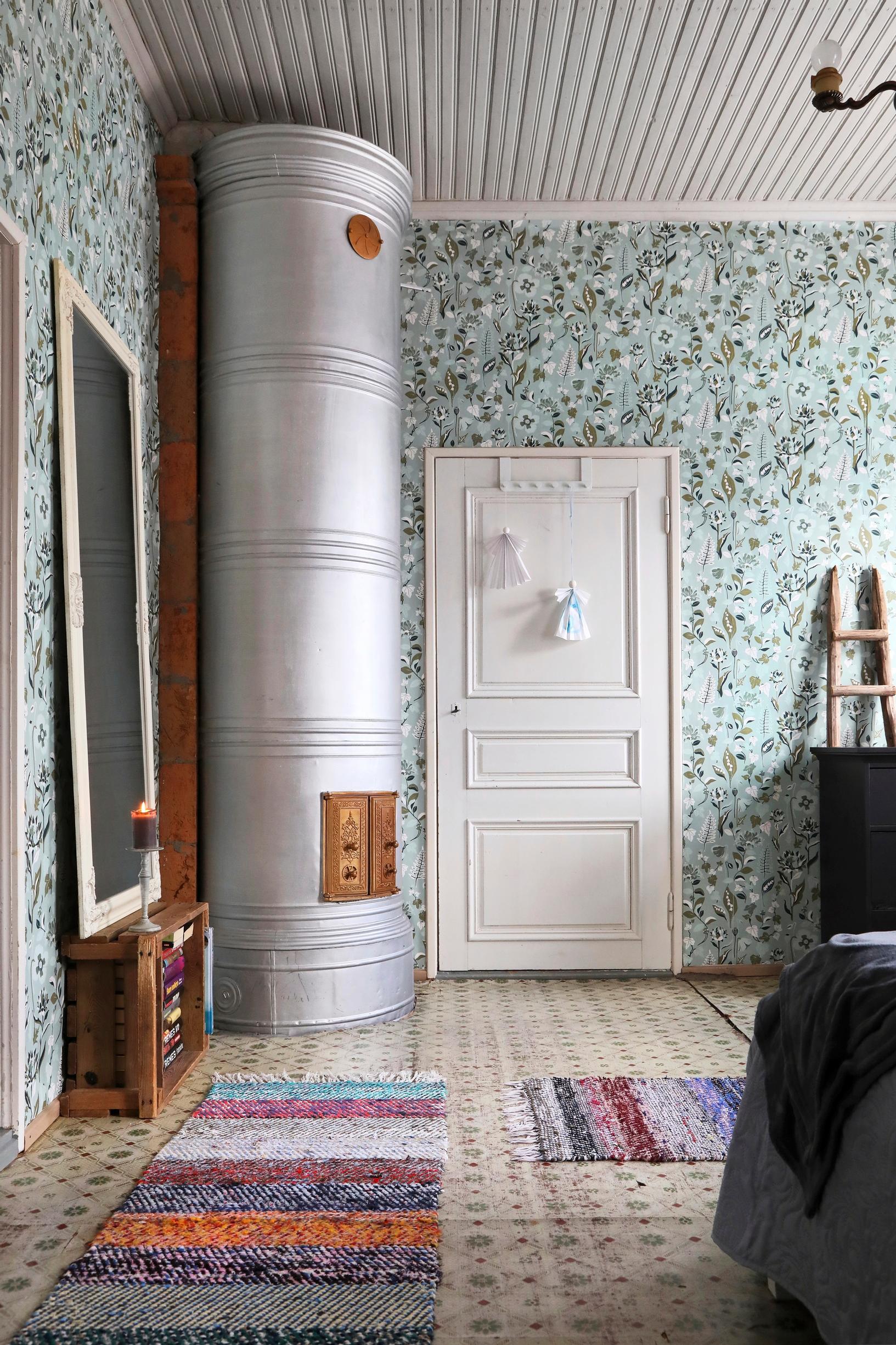 A metallic-hued barrel stove