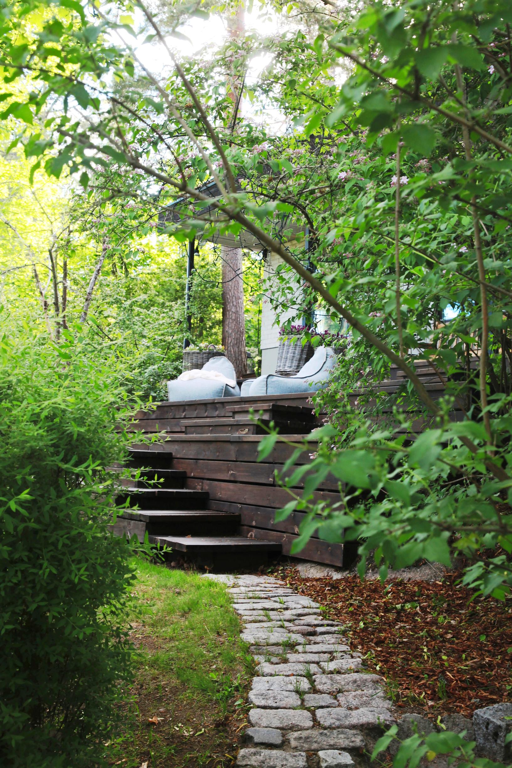 1970s garden: The tiered terrace area fits naturally into the slope.