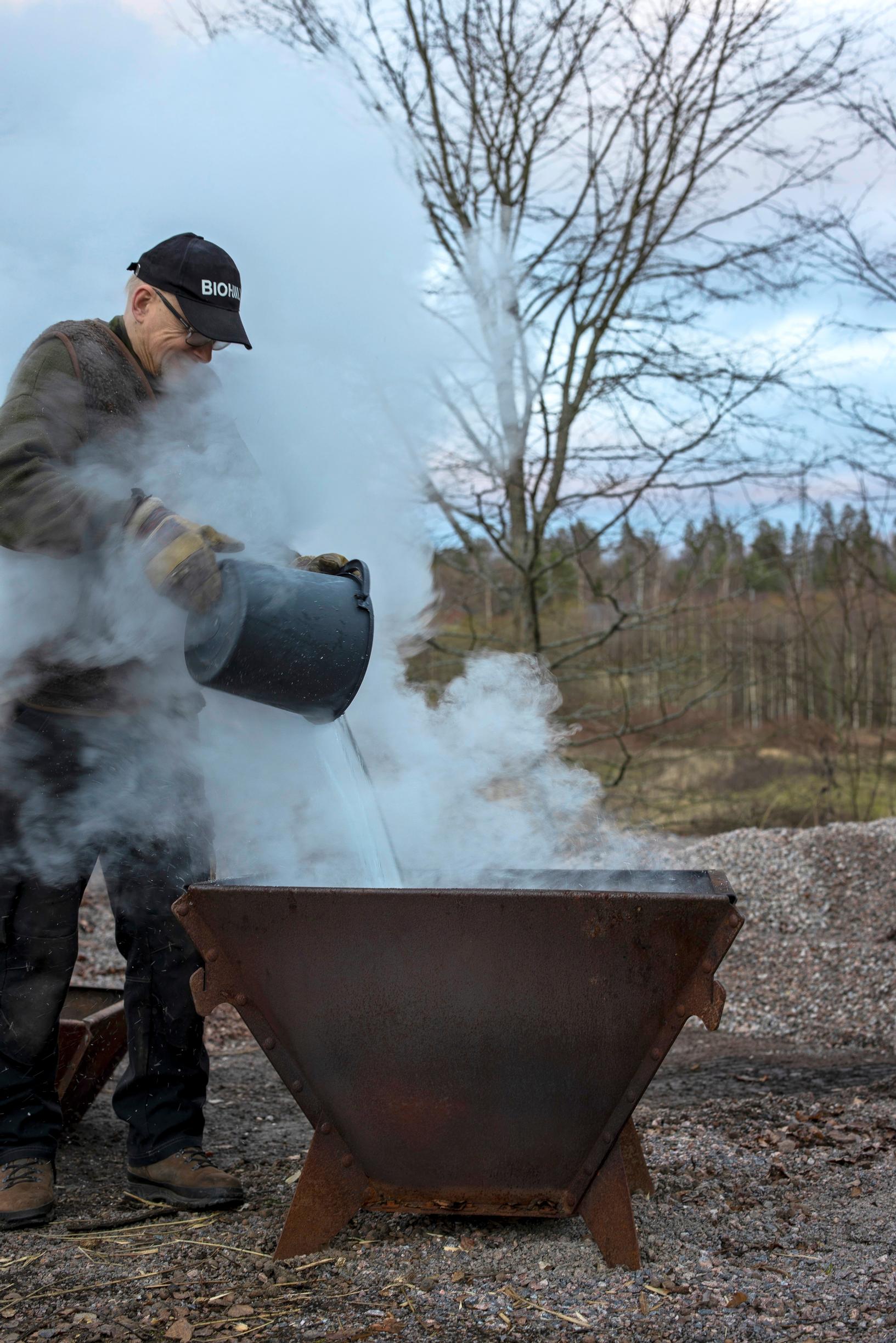 extinguishing the embers with water