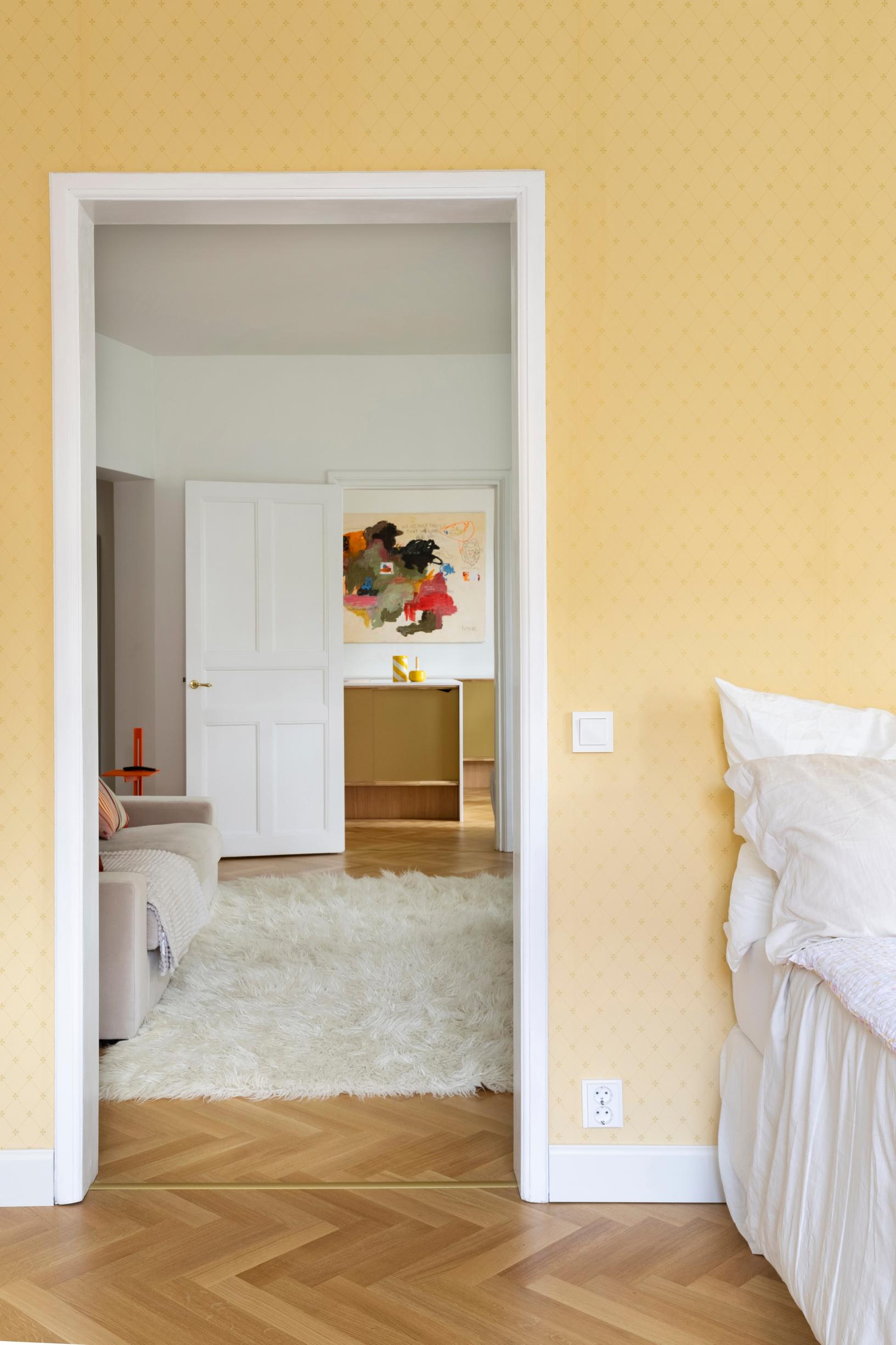 In this two-room apartment, the spaces flow together in a visually pleasing sequence.