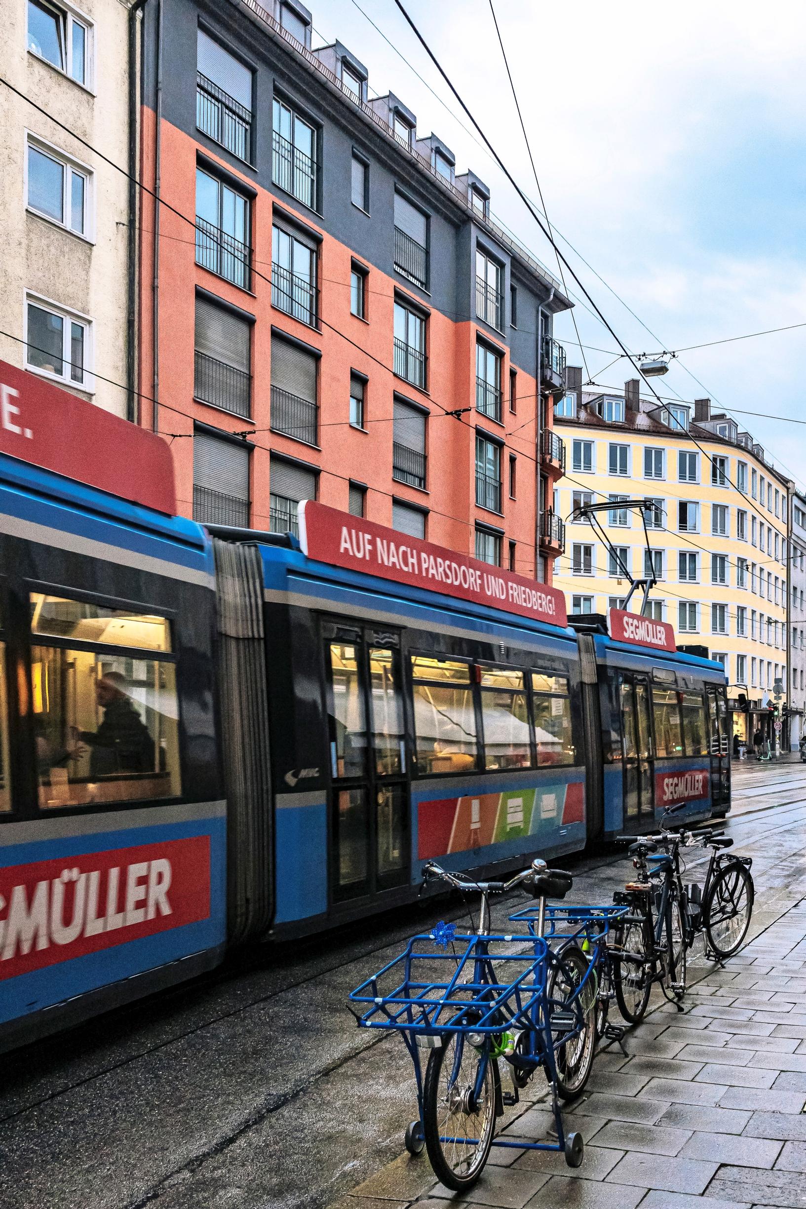 A tram on their home street