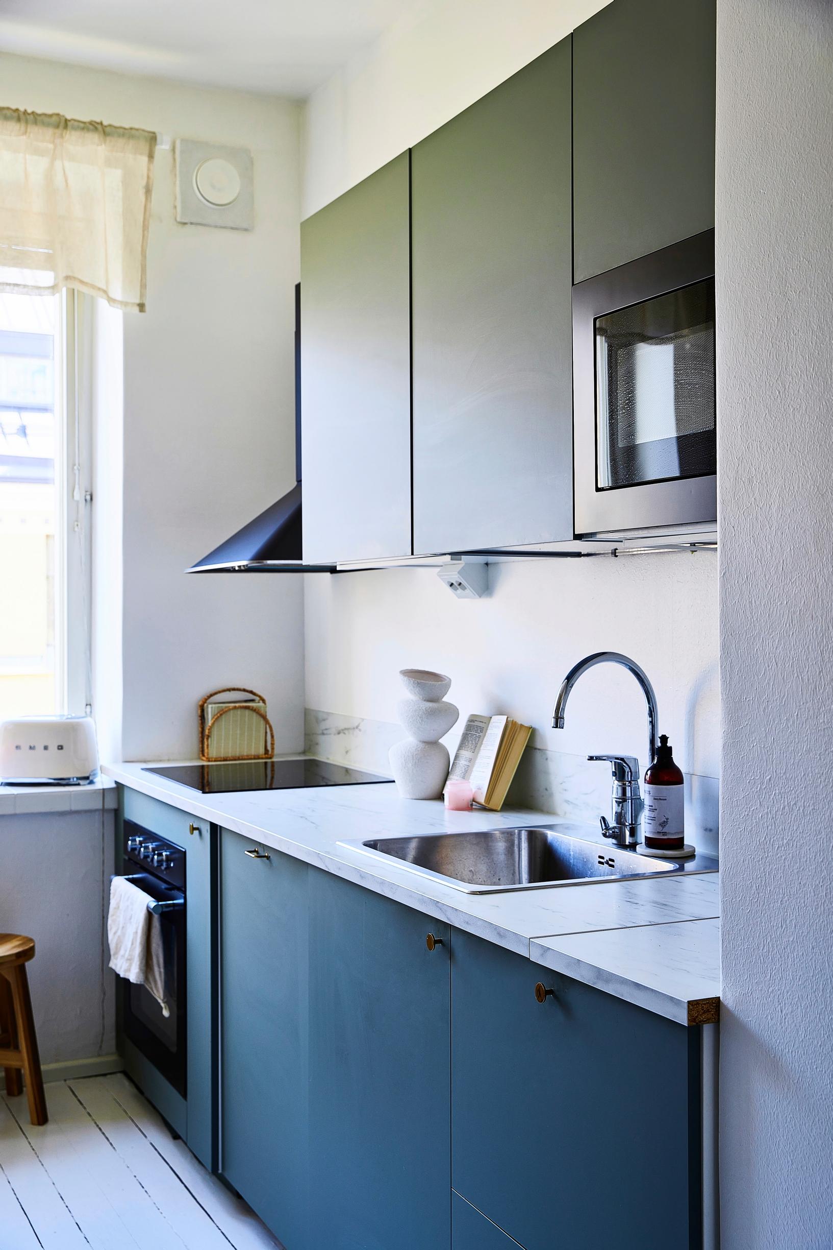 Kitchen with gray doors